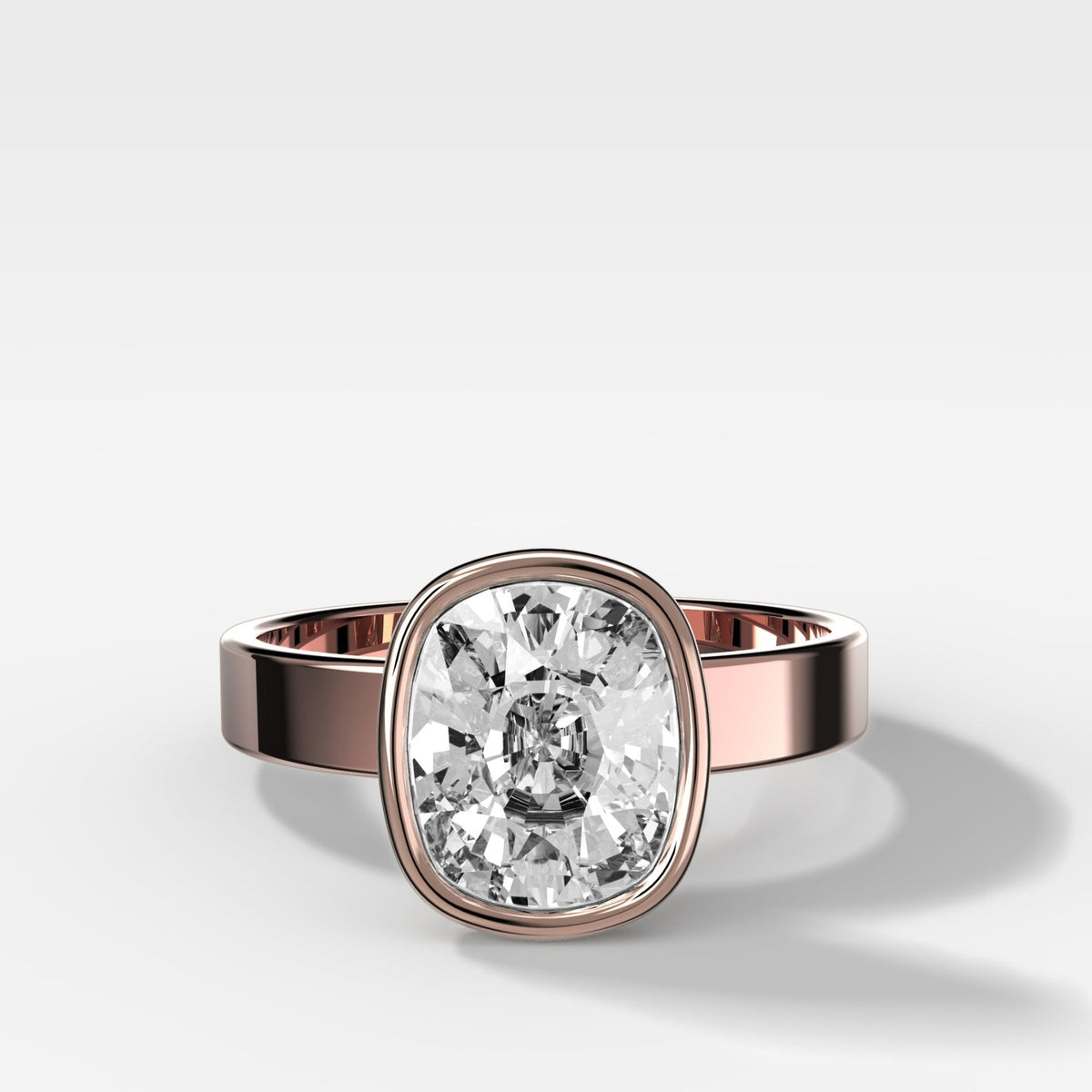 Finest Bezel Set Engagement Ring With Elongated Cushion Cut Diamond - GOODSTONE