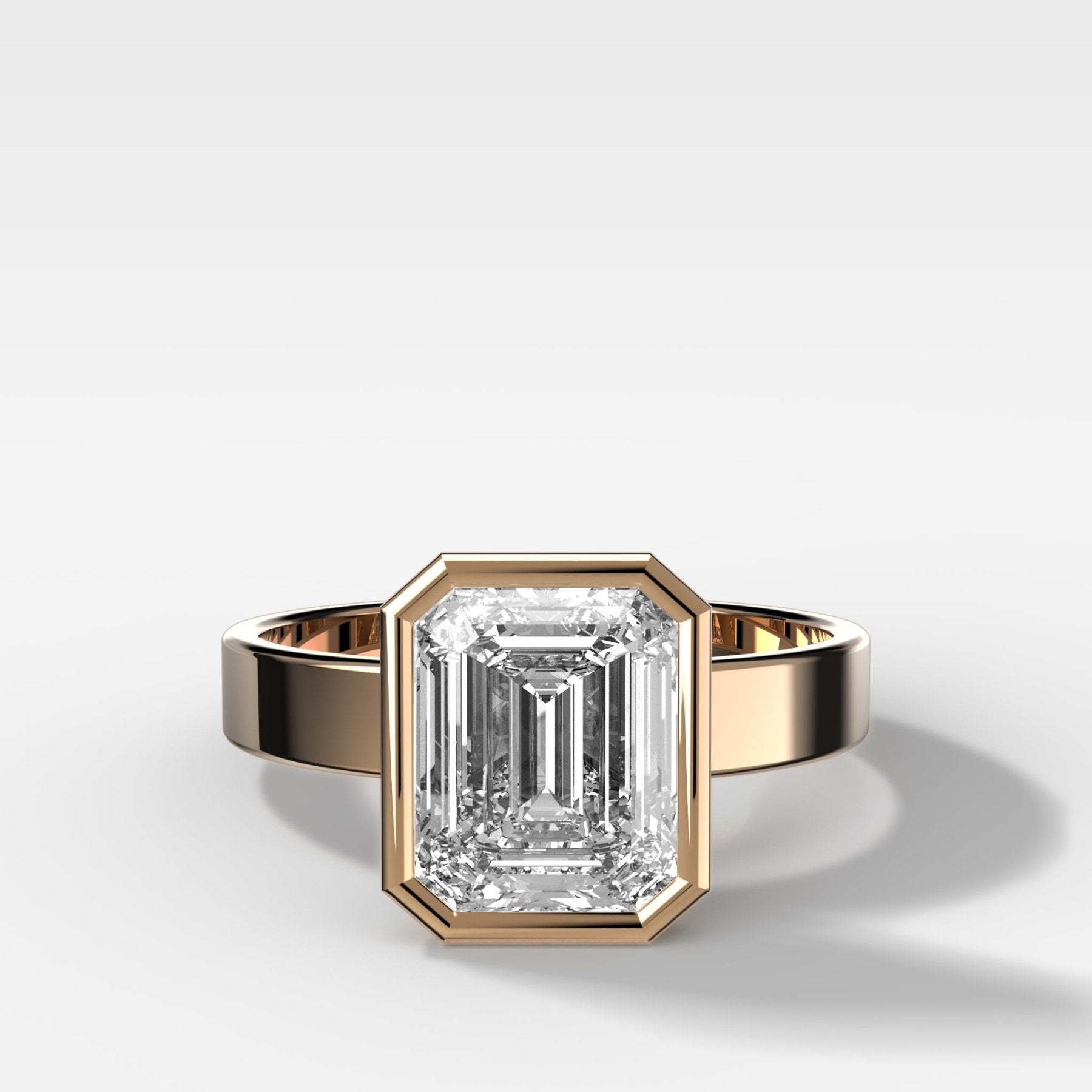 Finest Bezel Set Engagement Ring With Emerald Cut Diamond - GOODSTONE