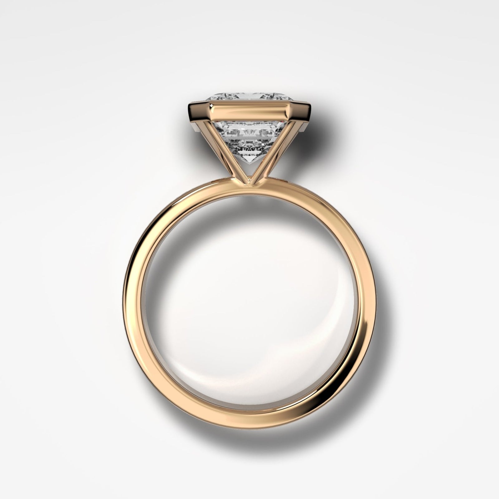 Finest Bezel Set Engagement Ring With Emerald Cut Diamond - GOODSTONE