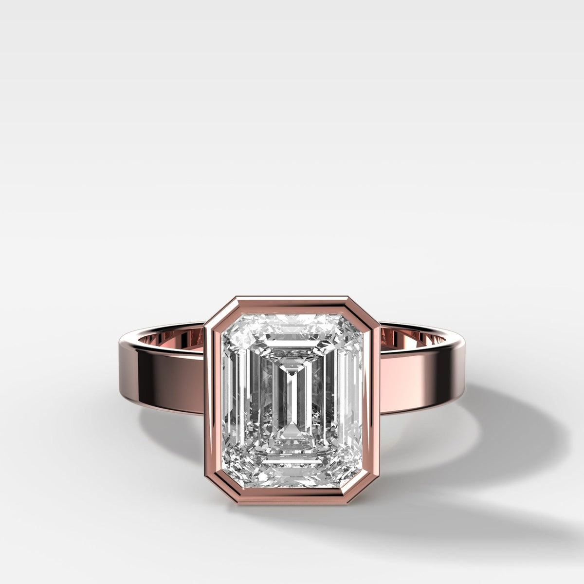 Finest Bezel Set Engagement Ring With Emerald Cut Diamond - GOODSTONE