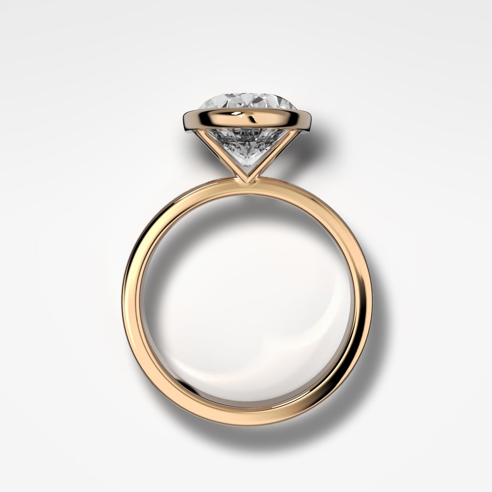 Finest Bezel Set Engagement Ring With Oval Cut Diamond - GOODSTONE