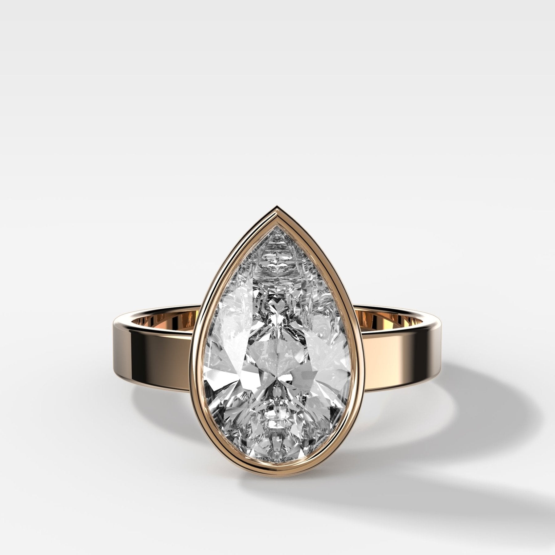 Finest Bezel Set Engagement Ring With Pear Cut Diamond - GOODSTONE