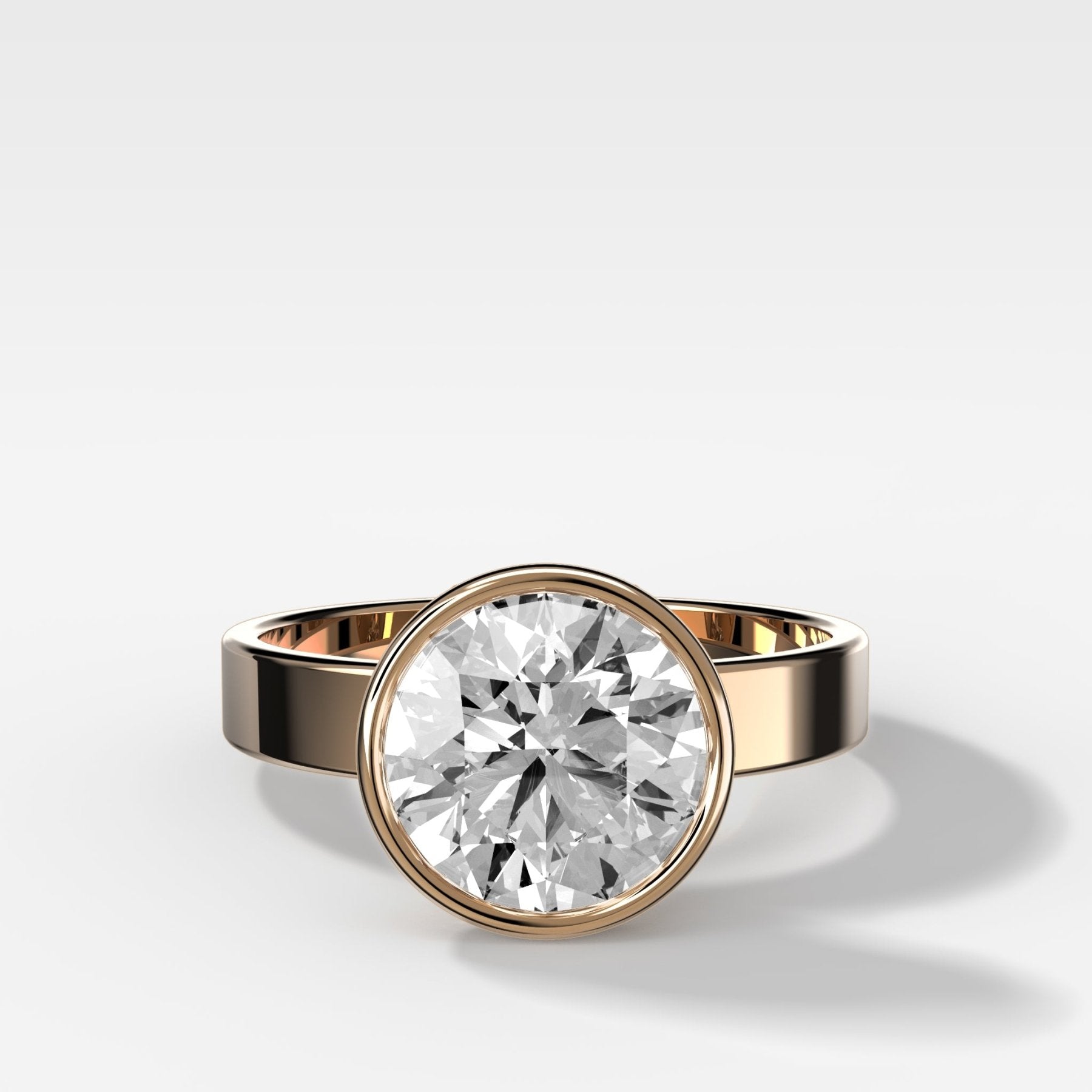 Finest Bezel Set Engagement Ring With Round Cut Diamond - GOODSTONE