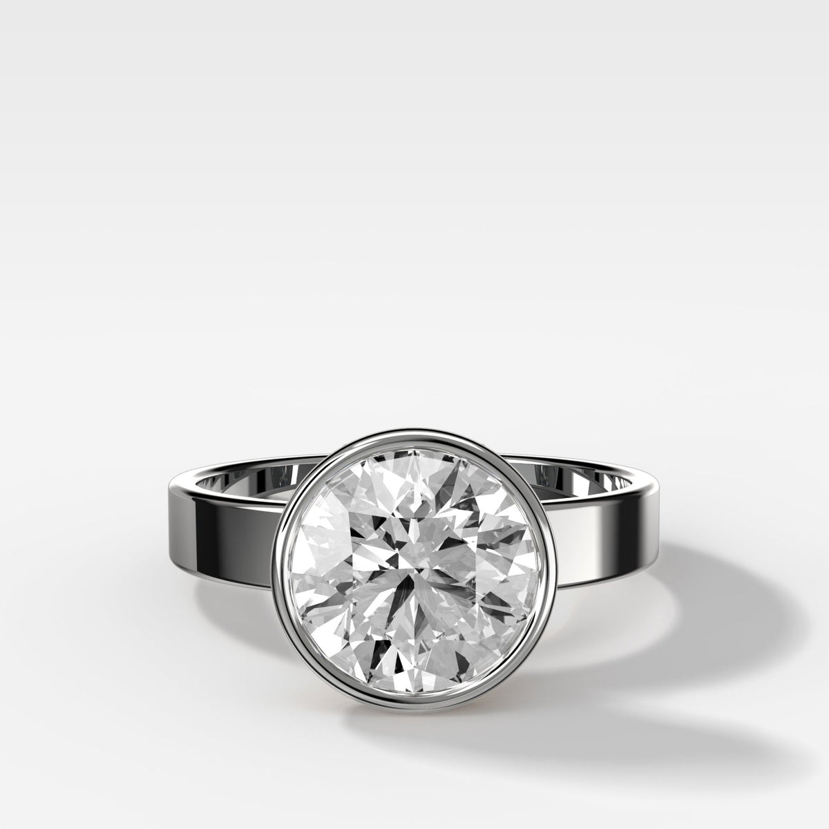Finest Bezel Set Engagement Ring With Round Cut Diamond - GOODSTONE
