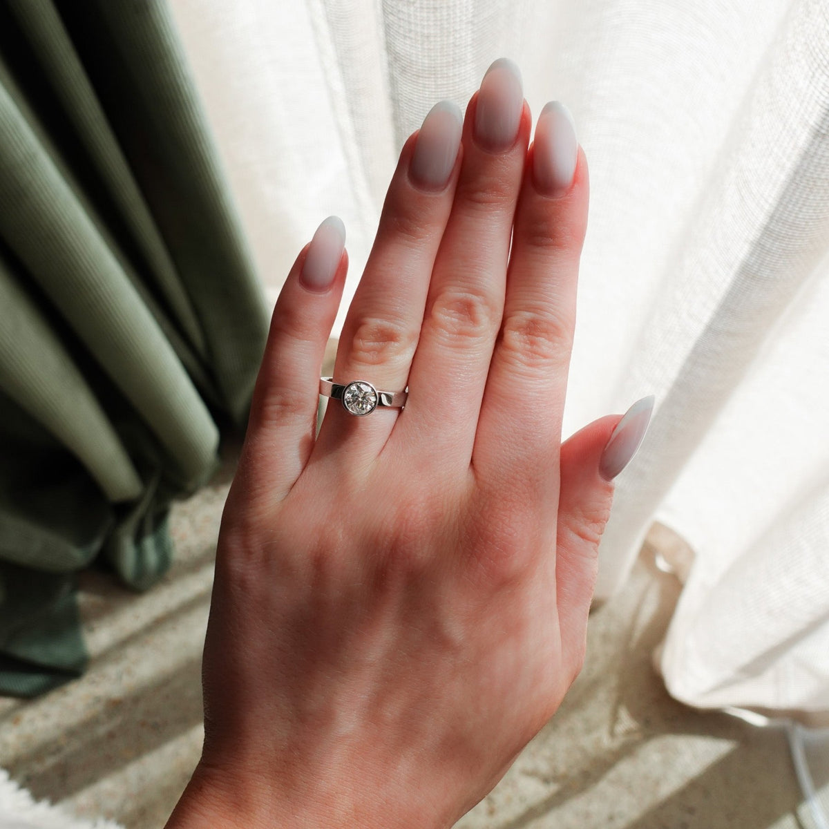 Finest Bezel Set Engagement Ring With Round Cut Diamond - GOODSTONE