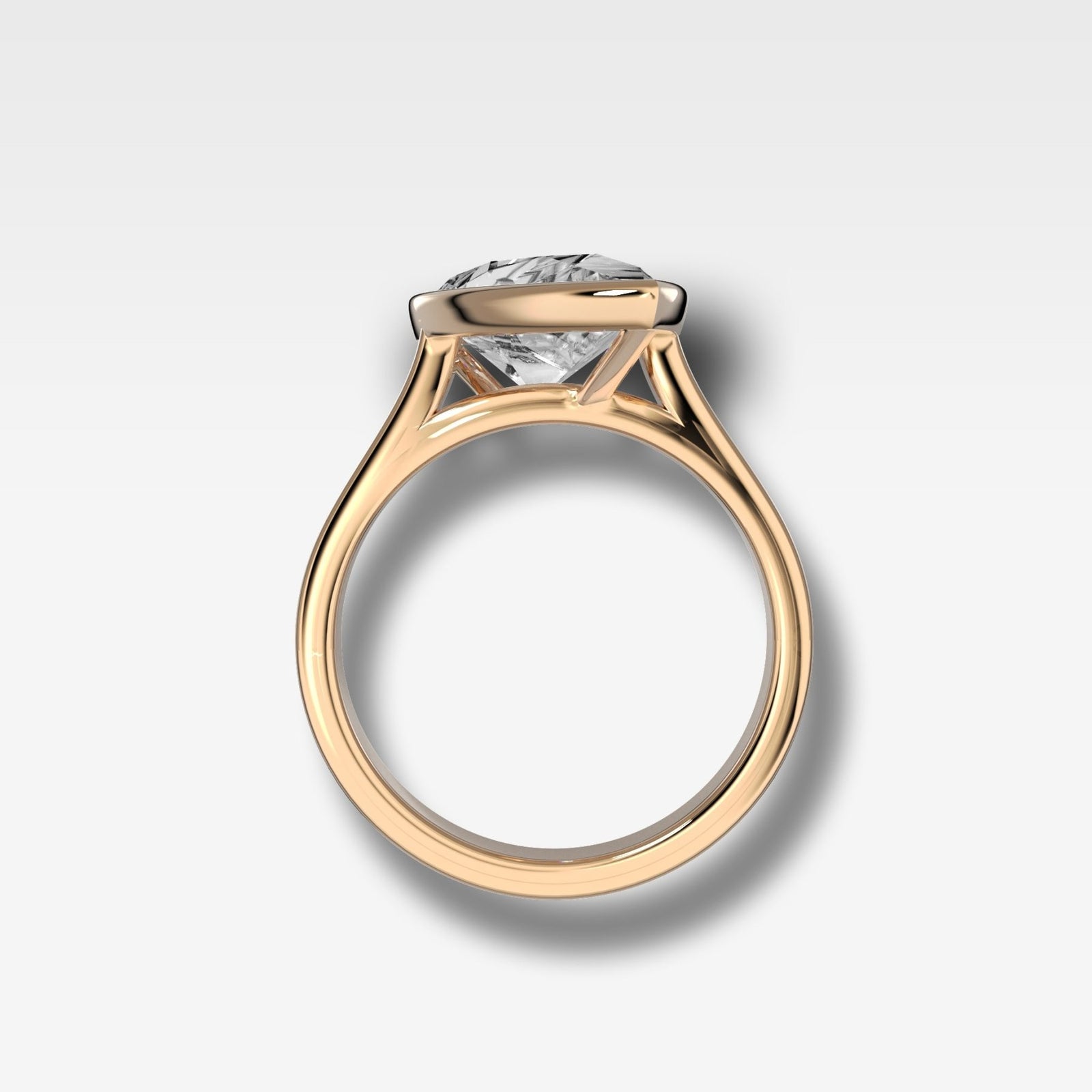 Finest Bezel Set Engagement Ring With Tilted Pear - GOODSTONE