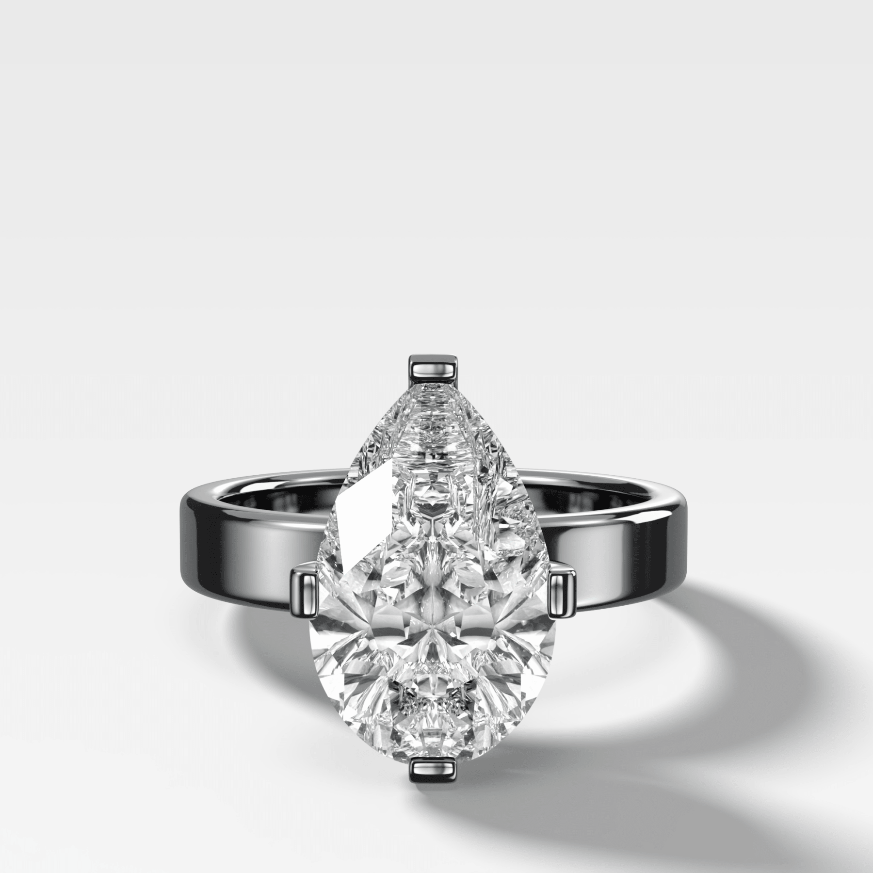 Finest Compass Solitaire Engagement Ring with Pear Cut Diamond - GOODSTONE