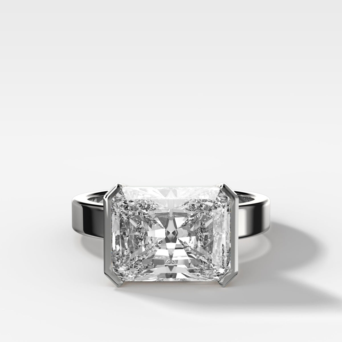 Finest Half Bezel Solitaire Engagement Ring With East West Elongated Radiant Cut Diamond - GOODSTONE