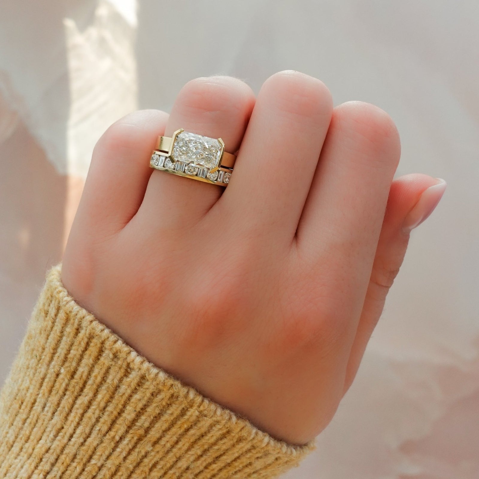 Finest Half Bezel Solitaire Engagement Ring With East West Elongated Radiant Cut Diamond - GOODSTONE