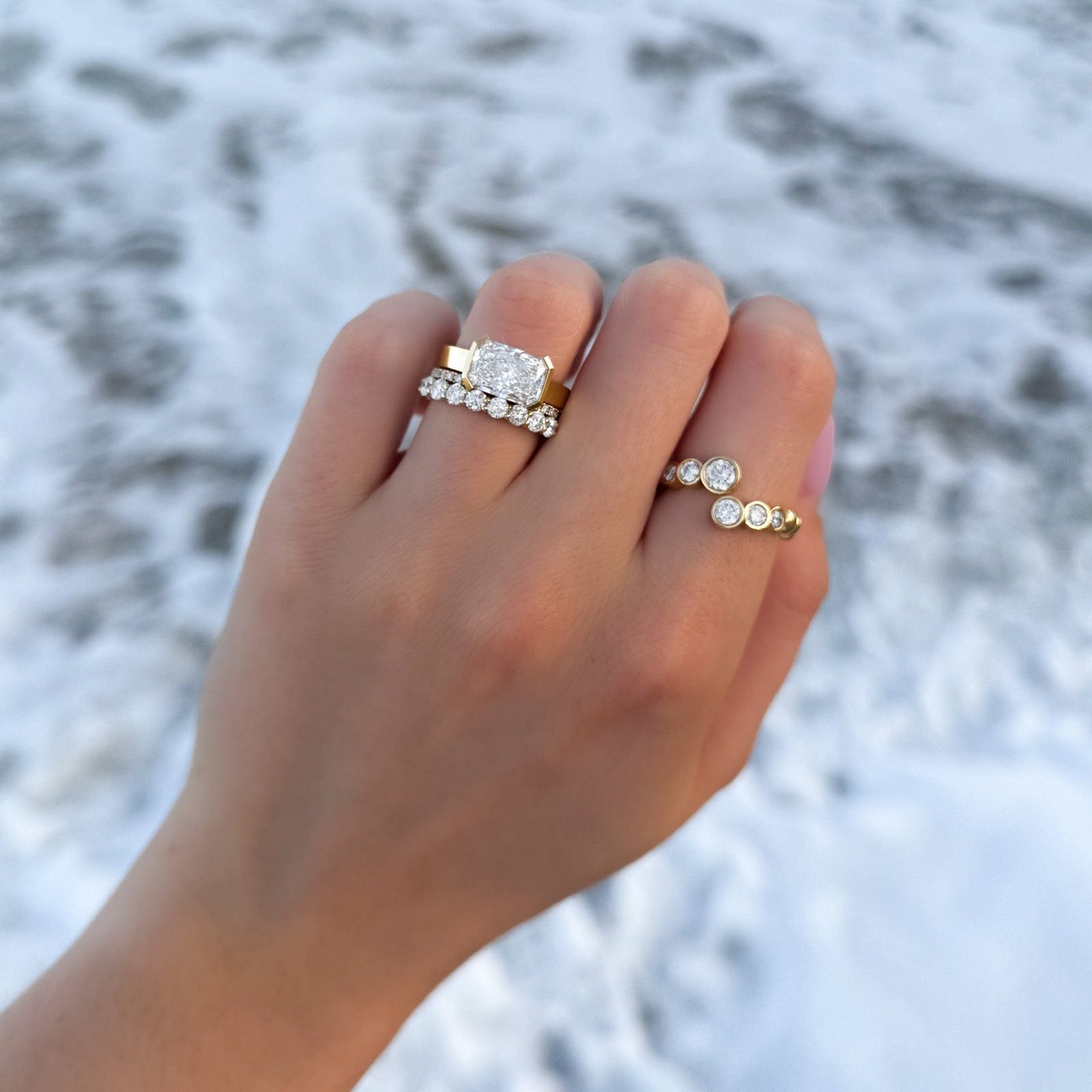 Finest Half Bezel Solitaire Engagement Ring With East West Elongated Radiant Cut Diamond - GOODSTONE