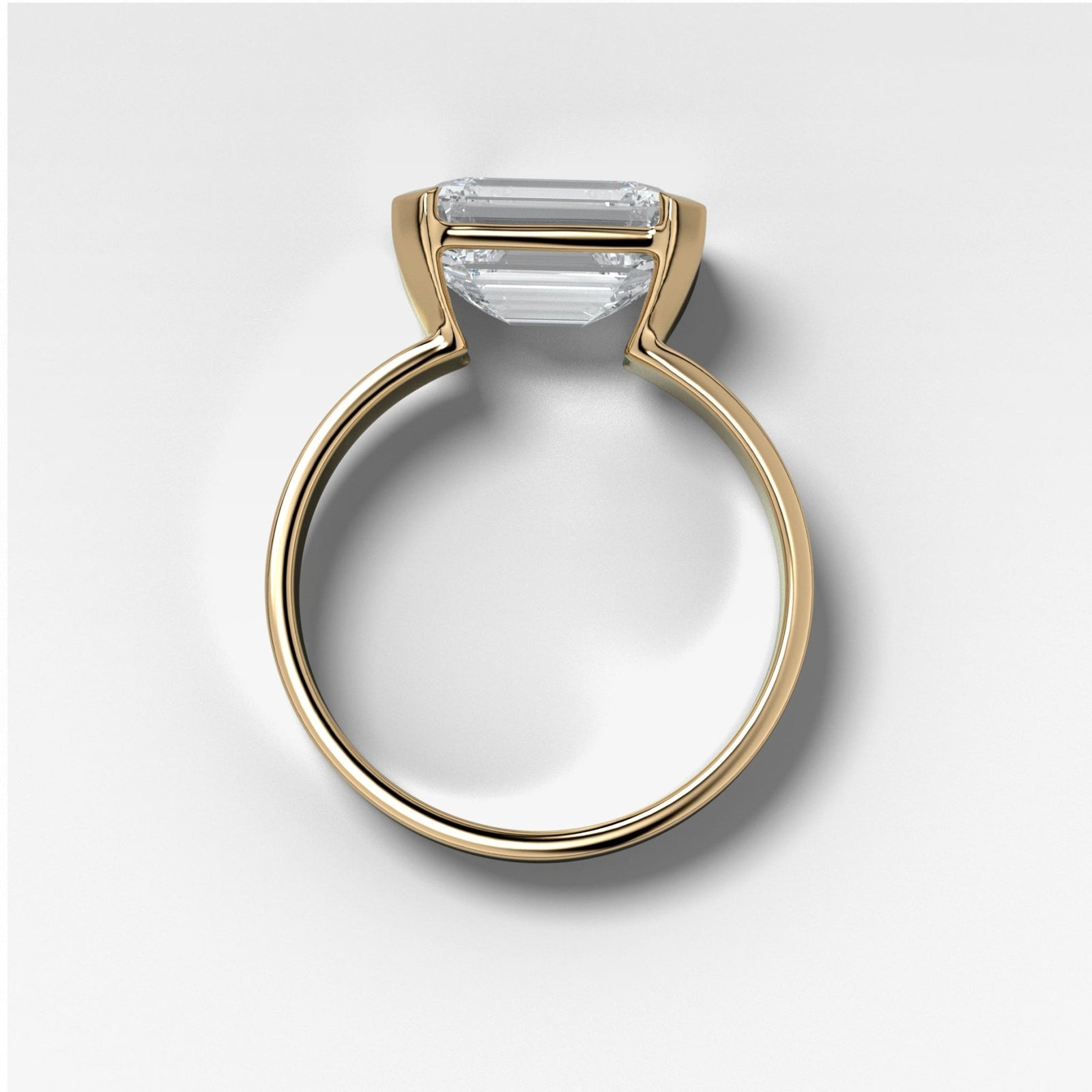 Finest Half Bezel Solitaire Engagement Ring With East West Emerald Cut Diamond - GOODSTONE