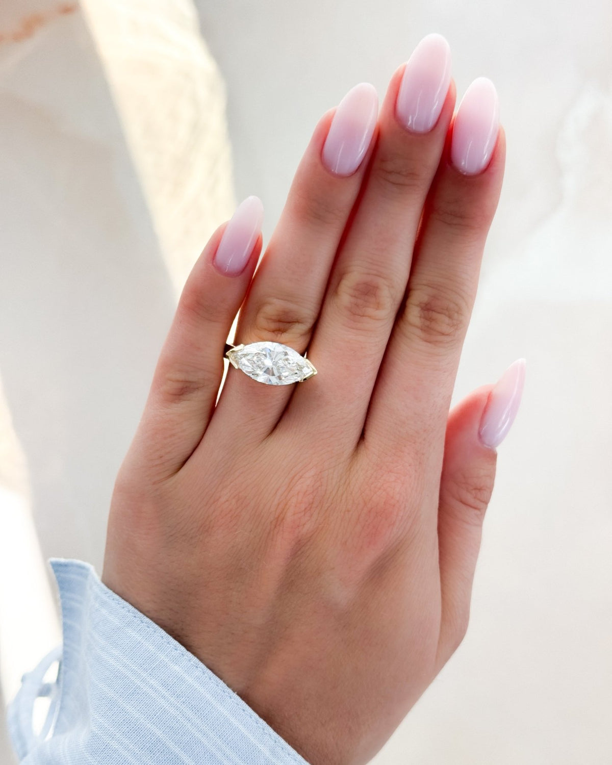 Finest Half Bezel Solitaire Engagement Ring With East West Marquise Cut Diamond - GOODSTONE