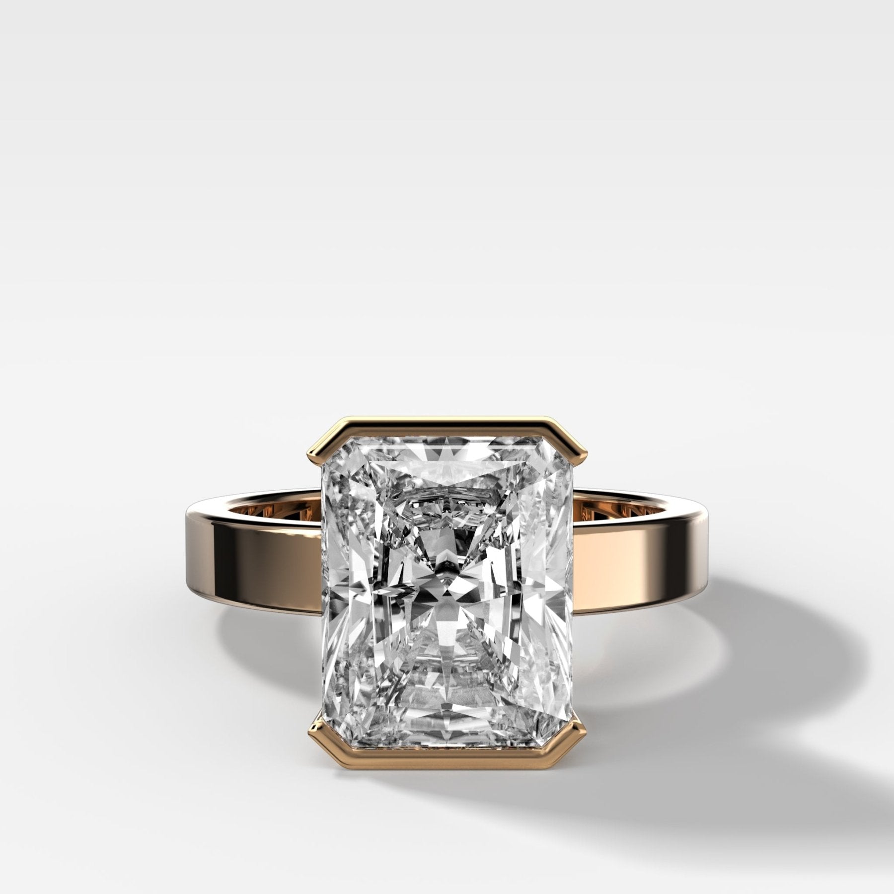 Finest Half Bezel Solitaire Engagement Ring With Elongated Radiant Cut Diamond - GOODSTONE