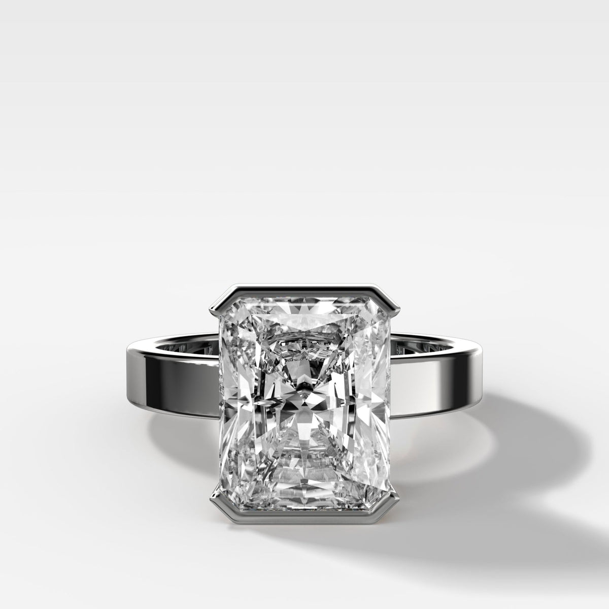 Finest Half Bezel Solitaire Engagement Ring With Elongated Radiant Cut Diamond - GOODSTONE
