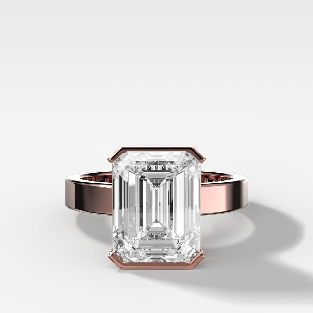 Finest Half Bezel Solitaire Engagement Ring With Emerald Cut Diamond - GOODSTONE