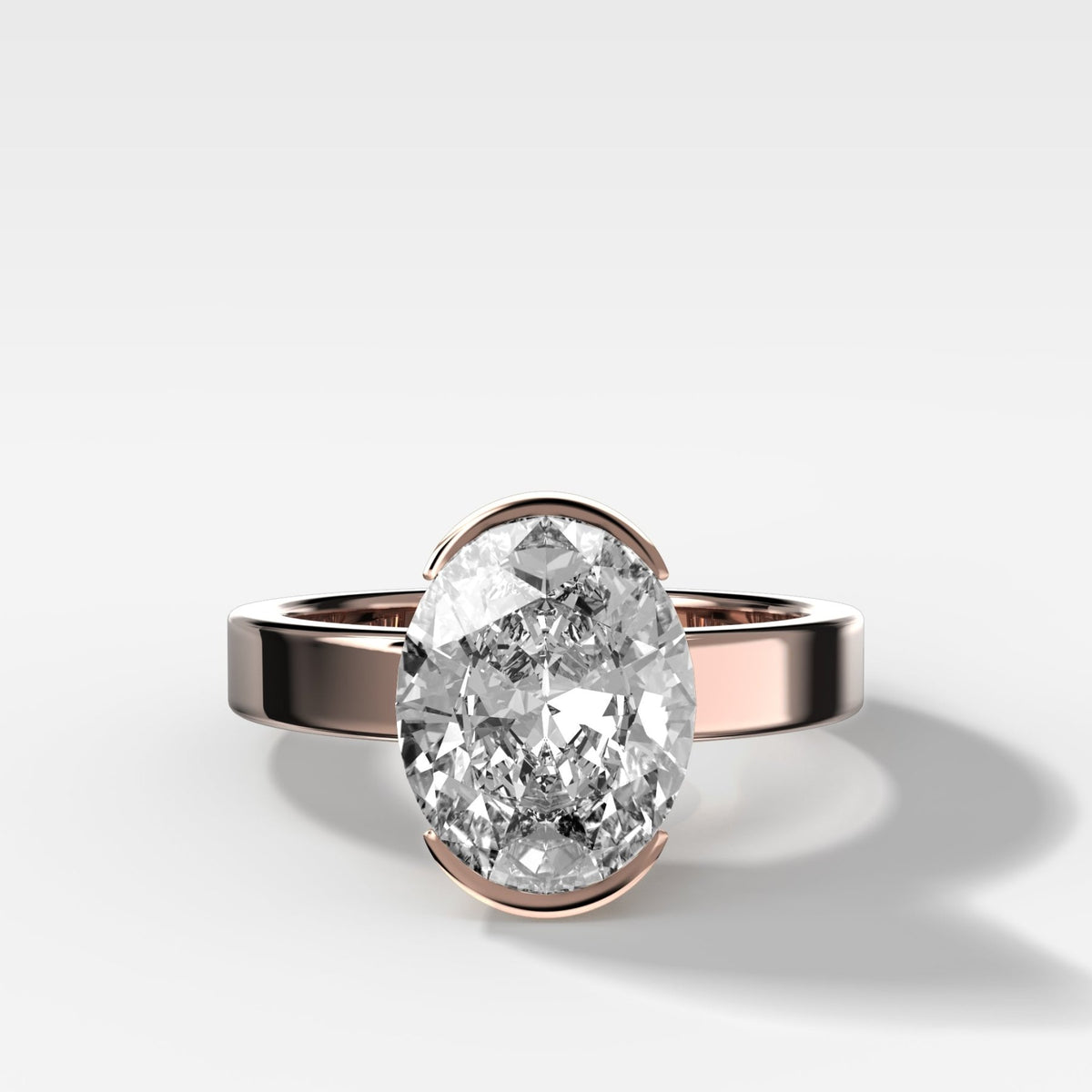Finest Half Bezel Solitaire Engagement Ring With Oval Cut Diamond - GOODSTONE