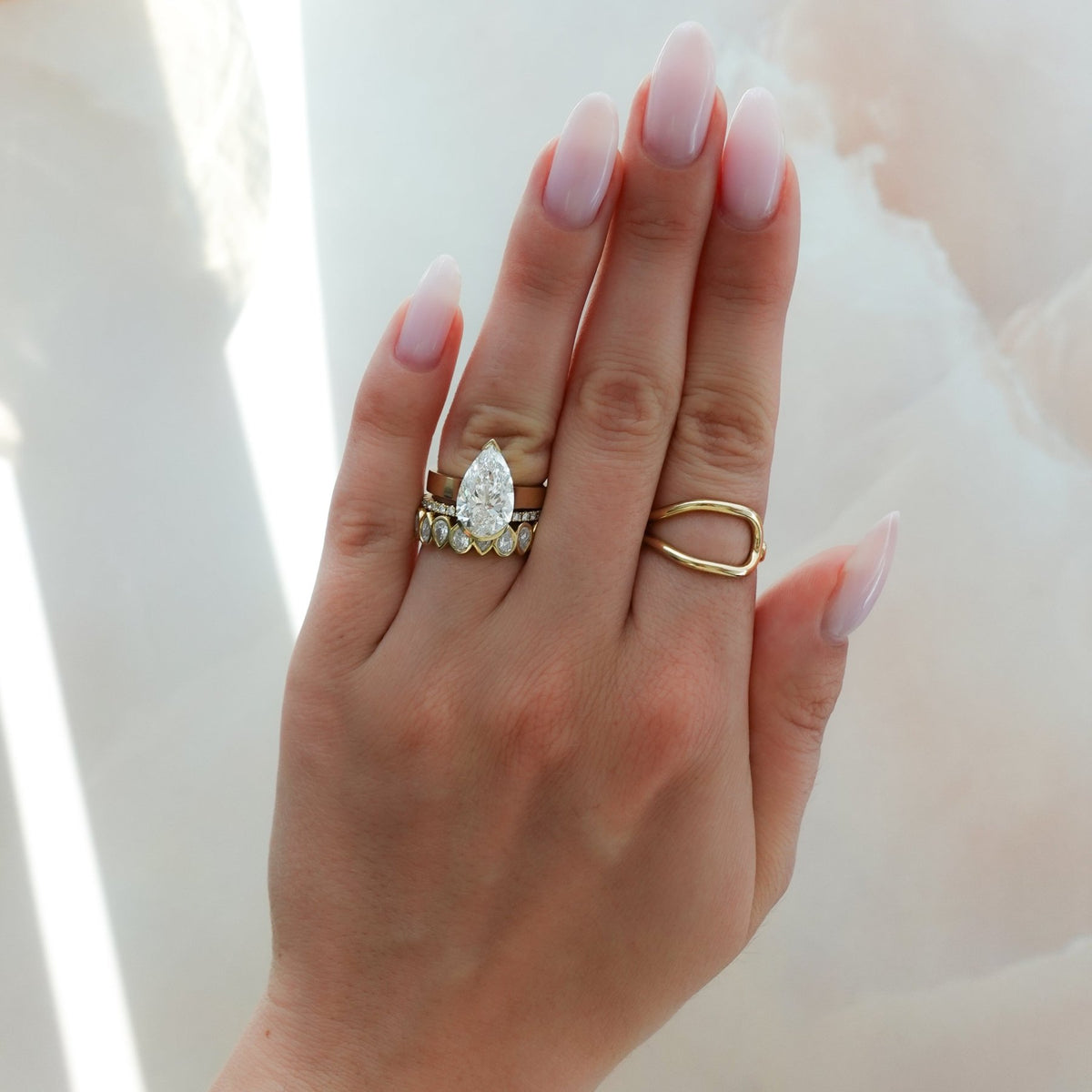 Finest Half Bezel Solitaire Engagement Ring With Pear Cut Diamond - GOODSTONE