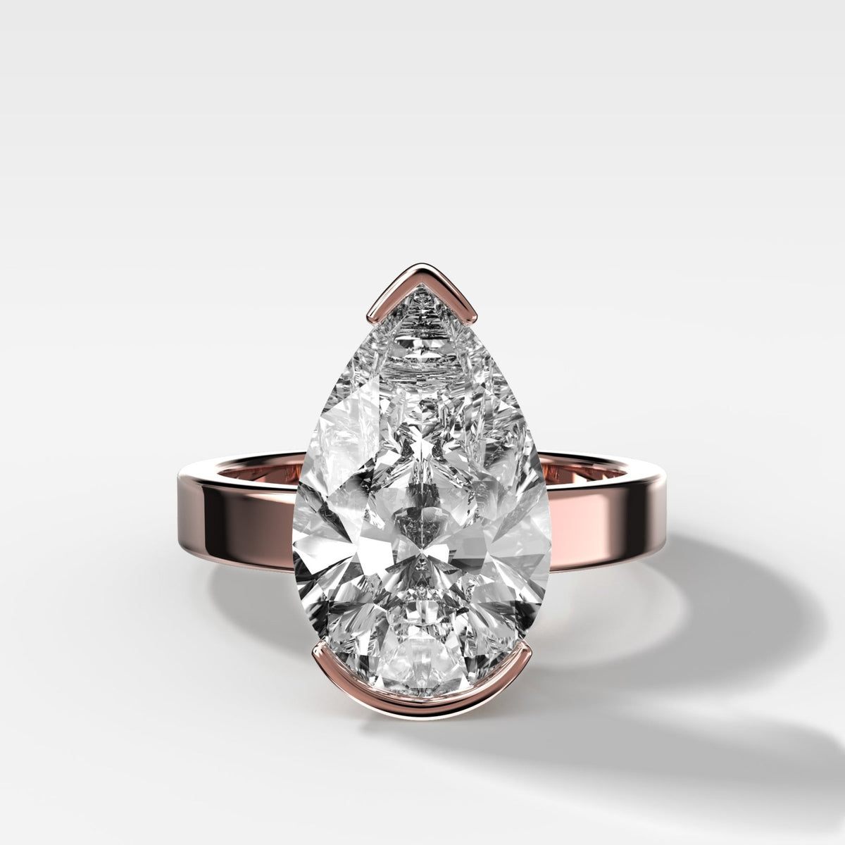 Finest Half Bezel Solitaire Engagement Ring With Pear Cut Diamond - GOODSTONE