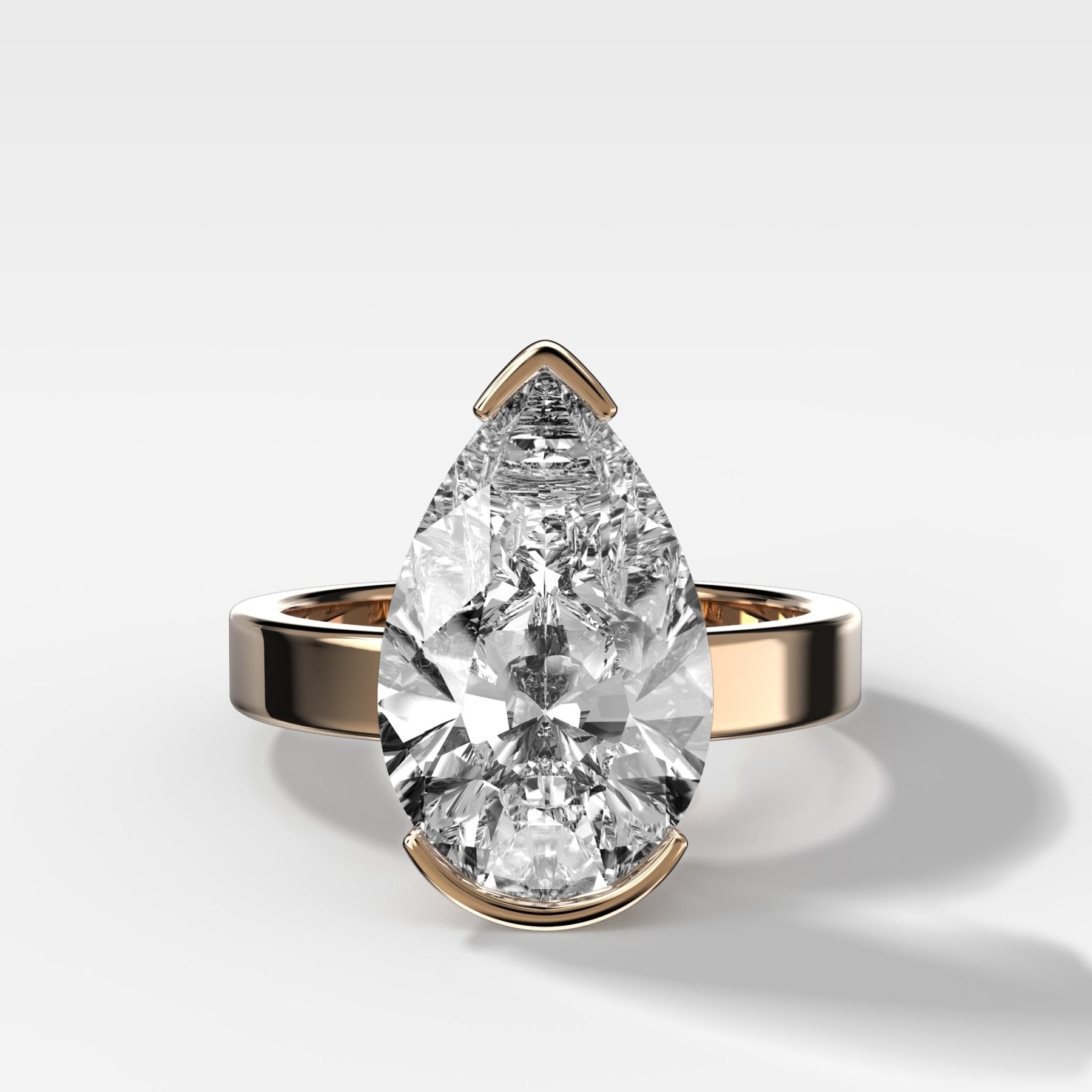Finest Half Bezel Solitaire Engagement Ring With Pear Cut Diamond - GOODSTONE