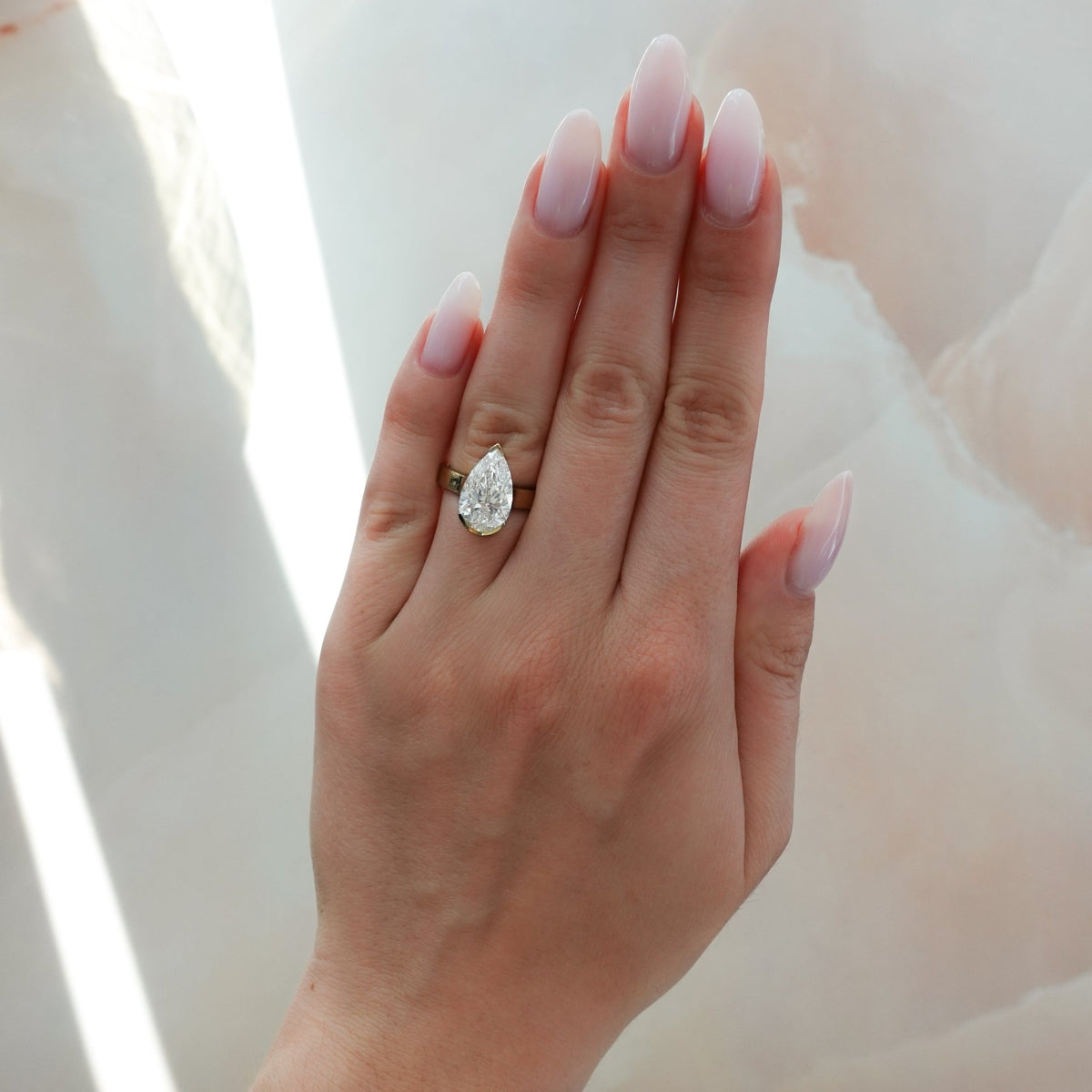 Finest Half Bezel Solitaire Engagement Ring With Pear Cut Diamond - GOODSTONE