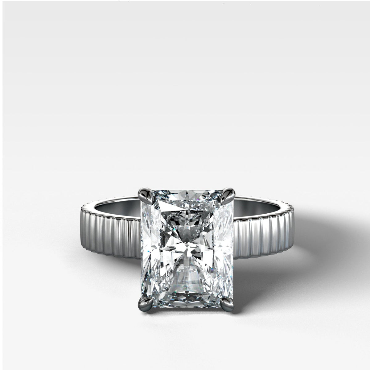 Finest Ridged Solitaire Engagement Ring With Elongated Radiant Cut Diamond - GOODSTONE