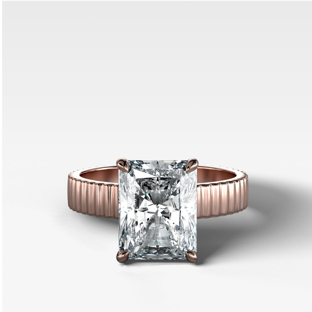 Finest Ridged Solitaire Engagement Ring With Elongated Radiant Cut Diamond - GOODSTONE