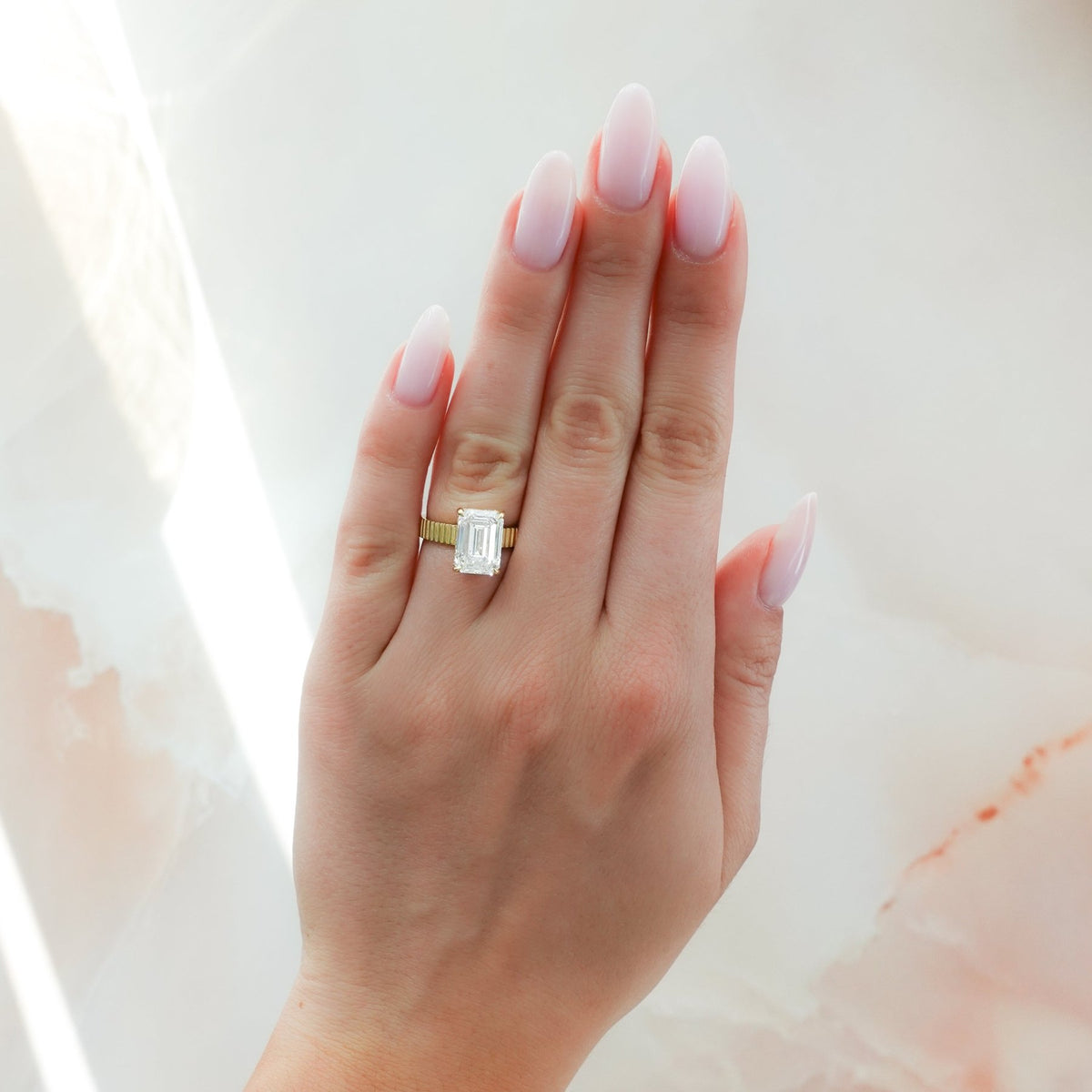 Finest Ridged Solitaire Engagement Ring With Emerald Cut Diamond - GOODSTONE