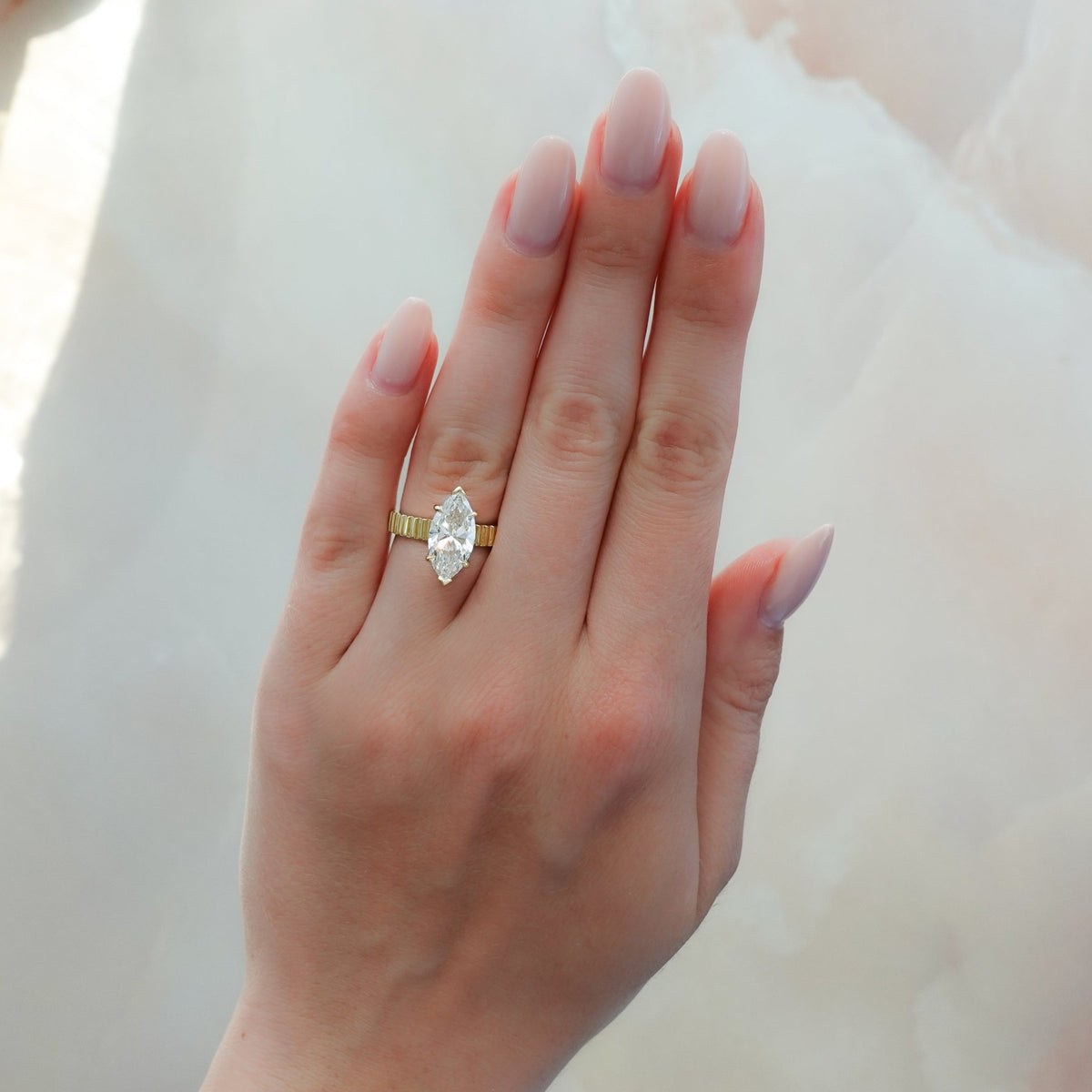 Finest Ridged Solitaire Engagement Ring With Marquise Cut Diamond - GOODSTONE