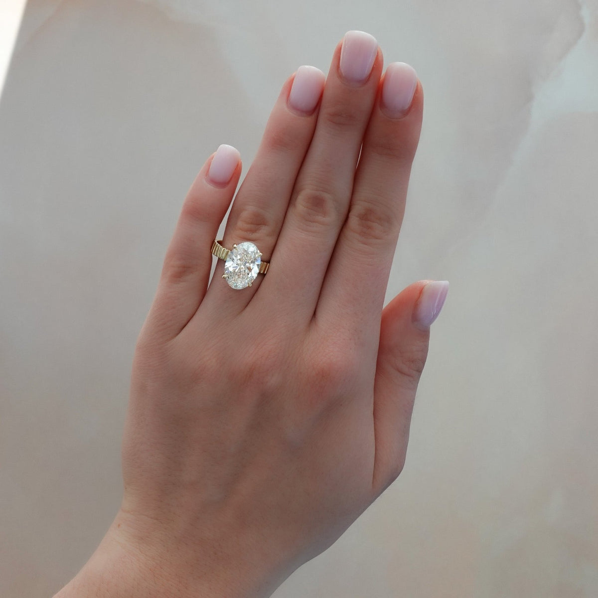 Finest Ridged Solitaire Engagement Ring With Oval Cut Diamond - GOODSTONE