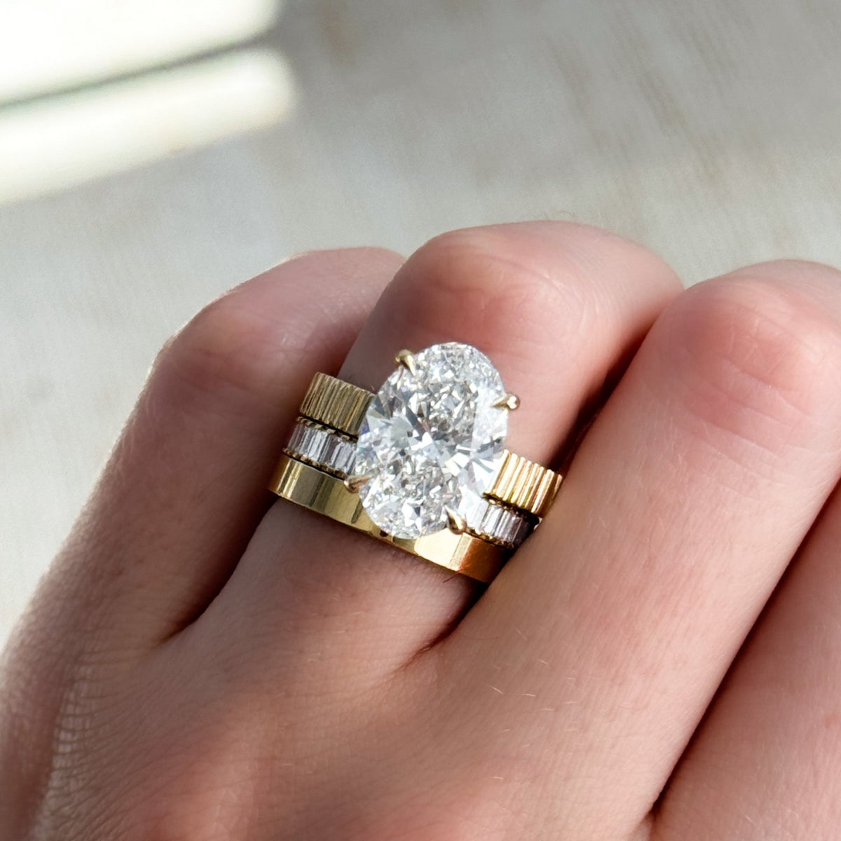 Finest Ridged Solitaire Engagement Ring With Oval Cut Diamond - GOODSTONE