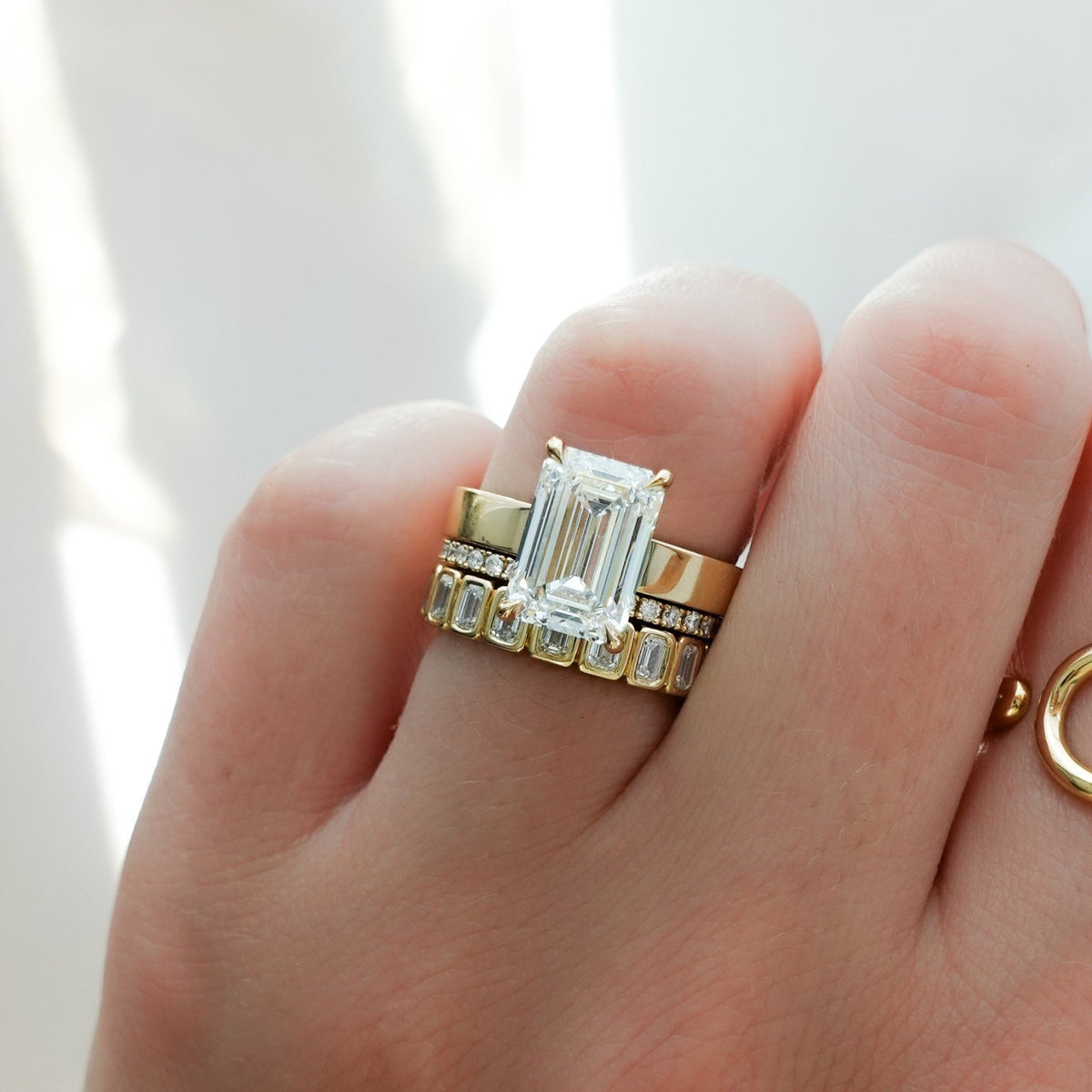 Finest Solitaire Engagement Ring With Emerald Cut Diamond - GOODSTONE