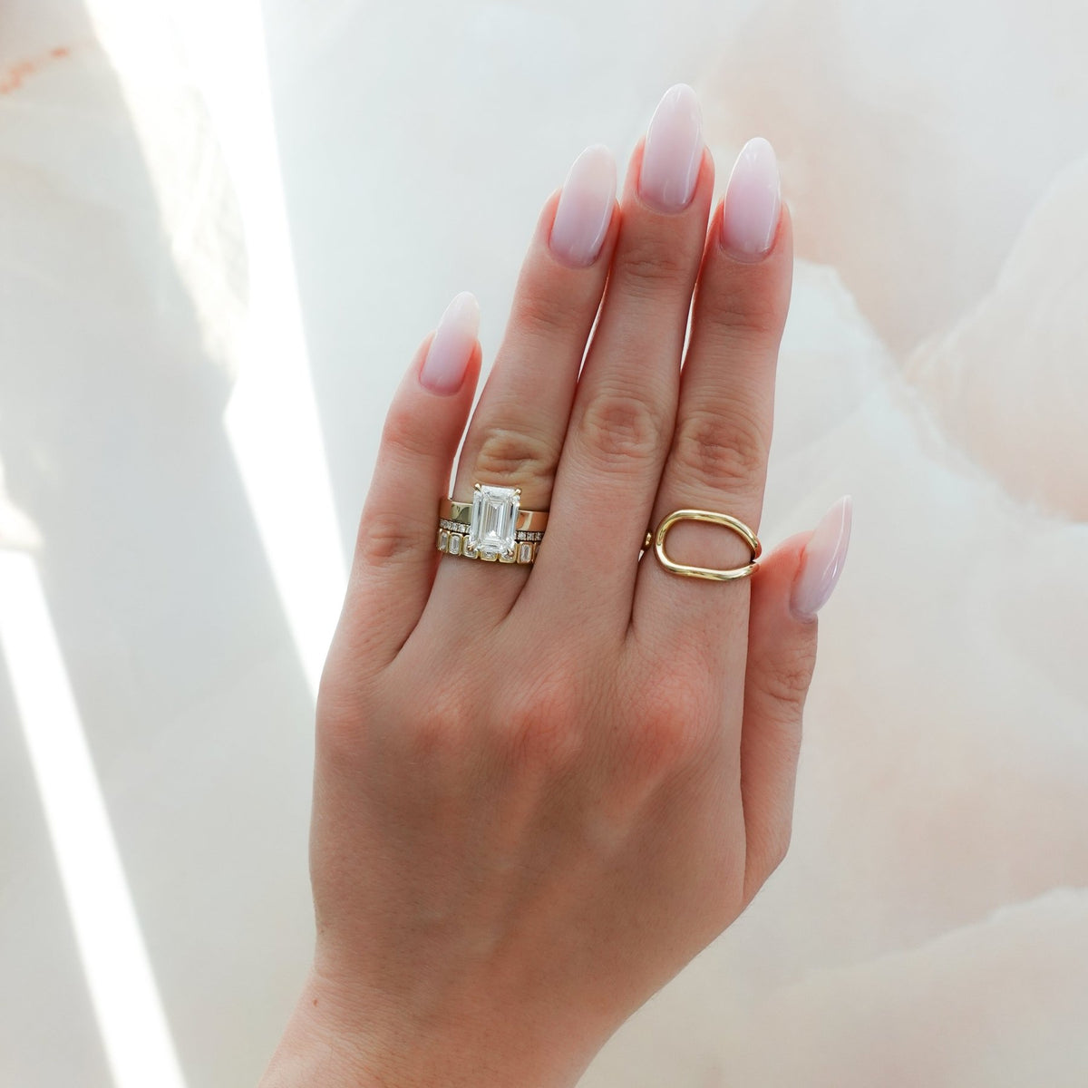 Finest Solitaire Engagement Ring With Emerald Cut Diamond - GOODSTONE