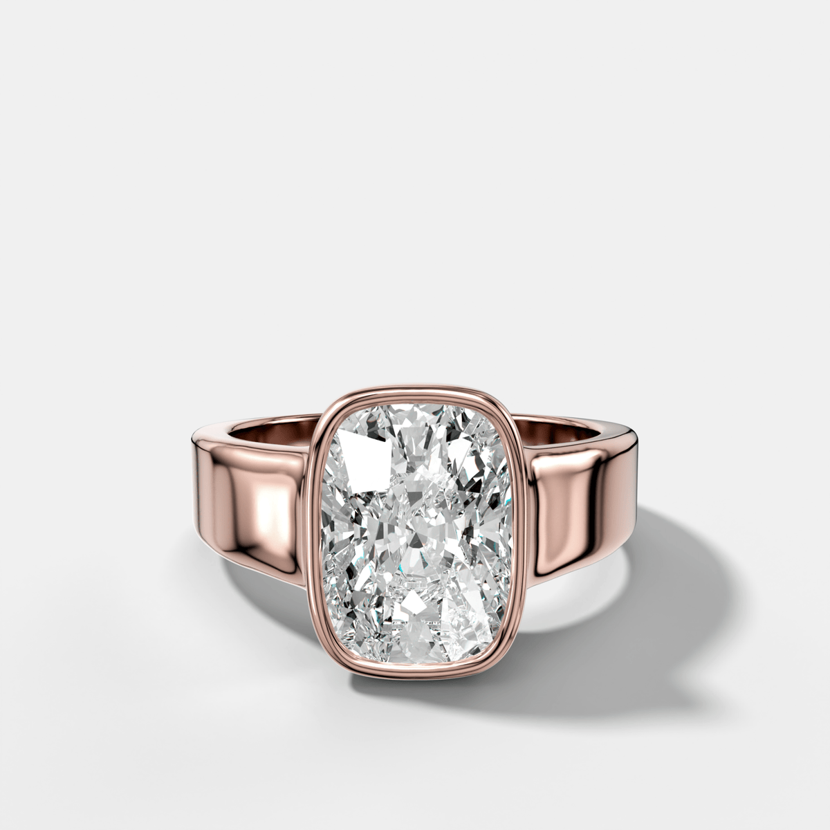 Finest Tapered Bezel Set Engagement Ring With Elongated Cushion Cut Diamond - GOODSTONE