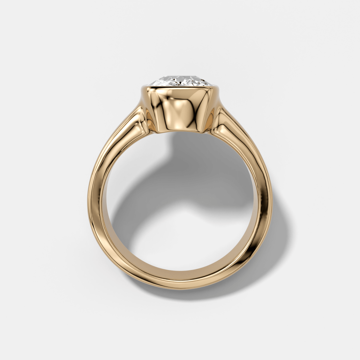 Finest Tapered Bezel Set Engagement Ring With Elongated Cushion Cut Diamond - GOODSTONE