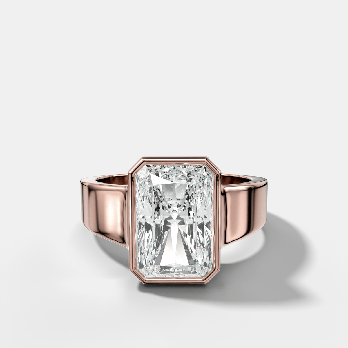 Finest Tapered Bezel Set Engagement Ring With Elongated Radiant Cut Diamond - GOODSTONE