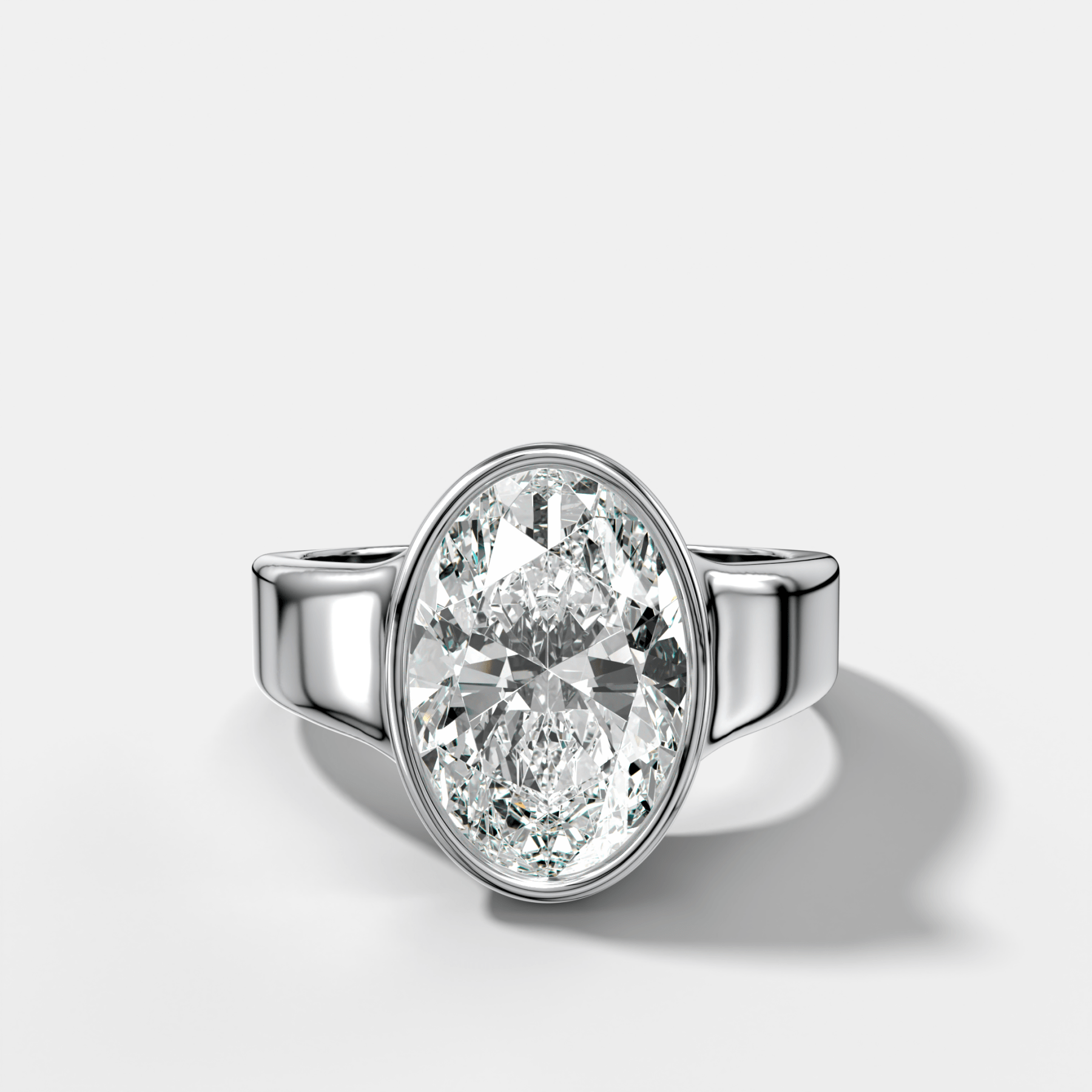 Oval Finest Tapered Bezel Set Engagement Ring | GoodStone