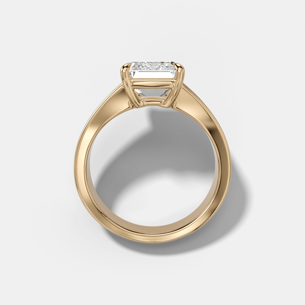 Finest Tapered Engagement Ring With Emerald Cut Diamond - GOODSTONE