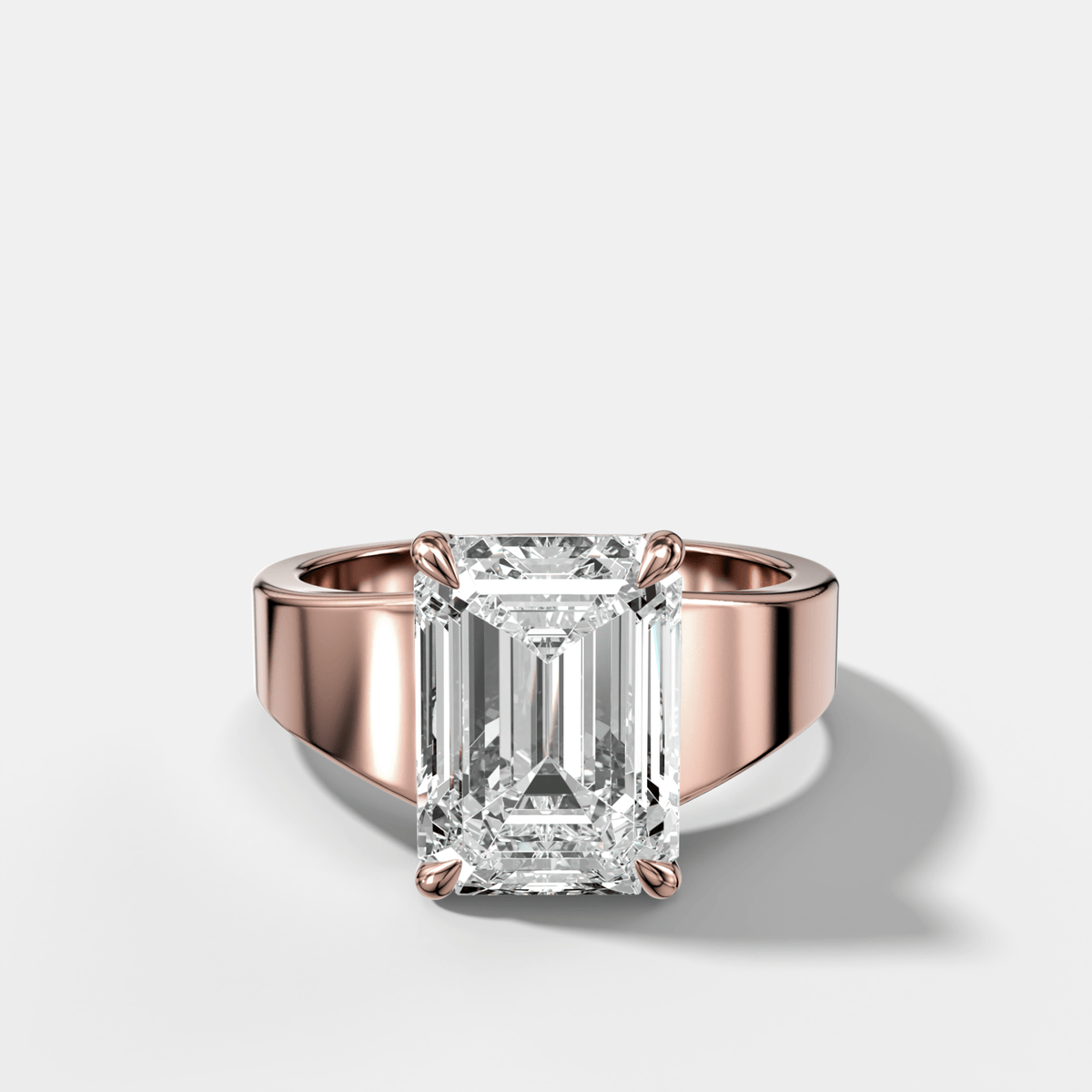 Finest Tapered Engagement Ring With Emerald Cut Diamond - GOODSTONE