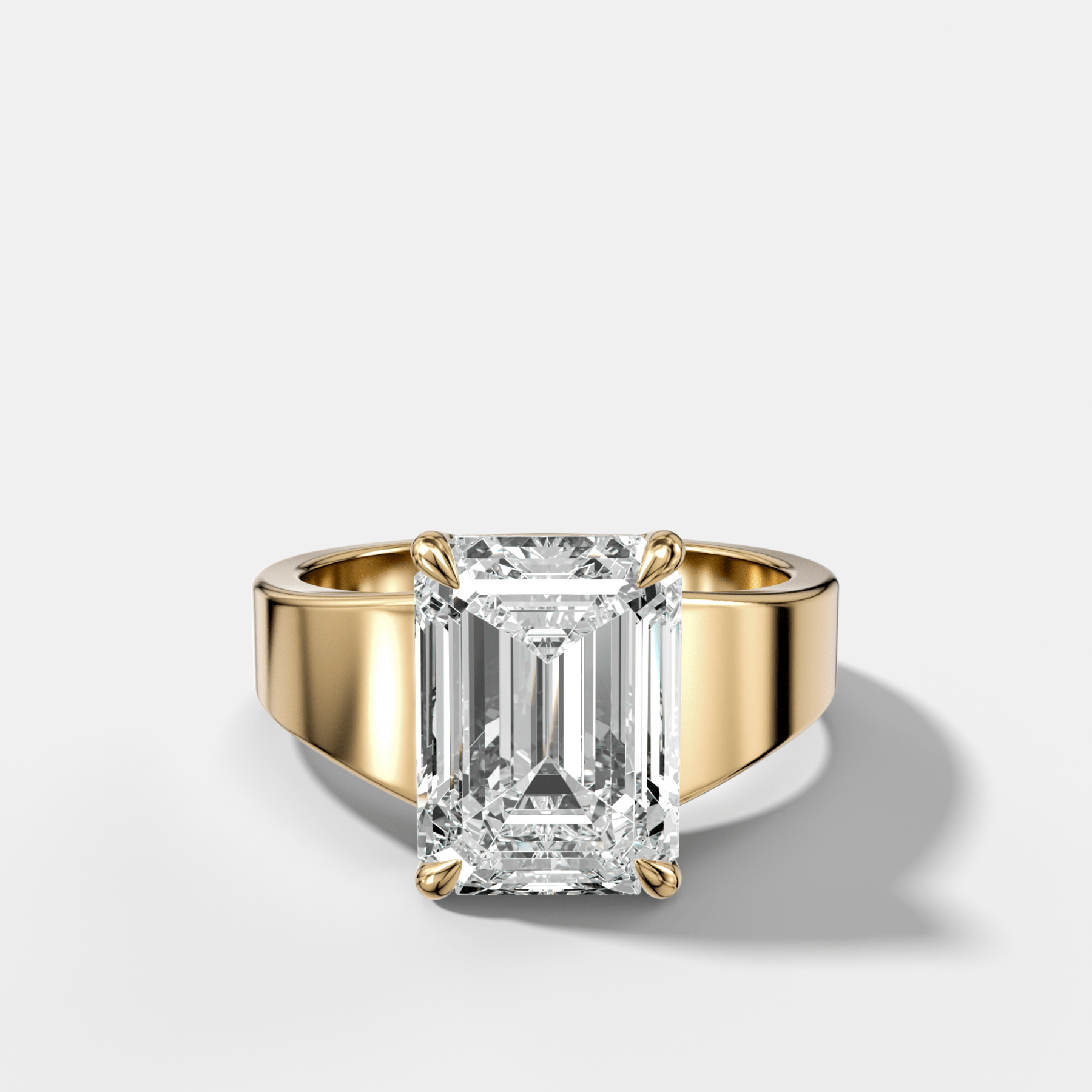 Finest Tapered Engagement Ring With Emerald Cut Diamond - GOODSTONE