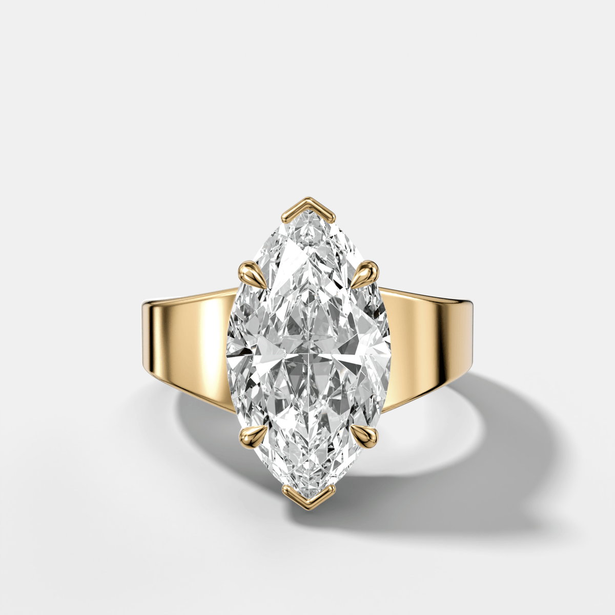 Finest Tapered Engagement Ring With Marquise Cut Diamond - GOODSTONE