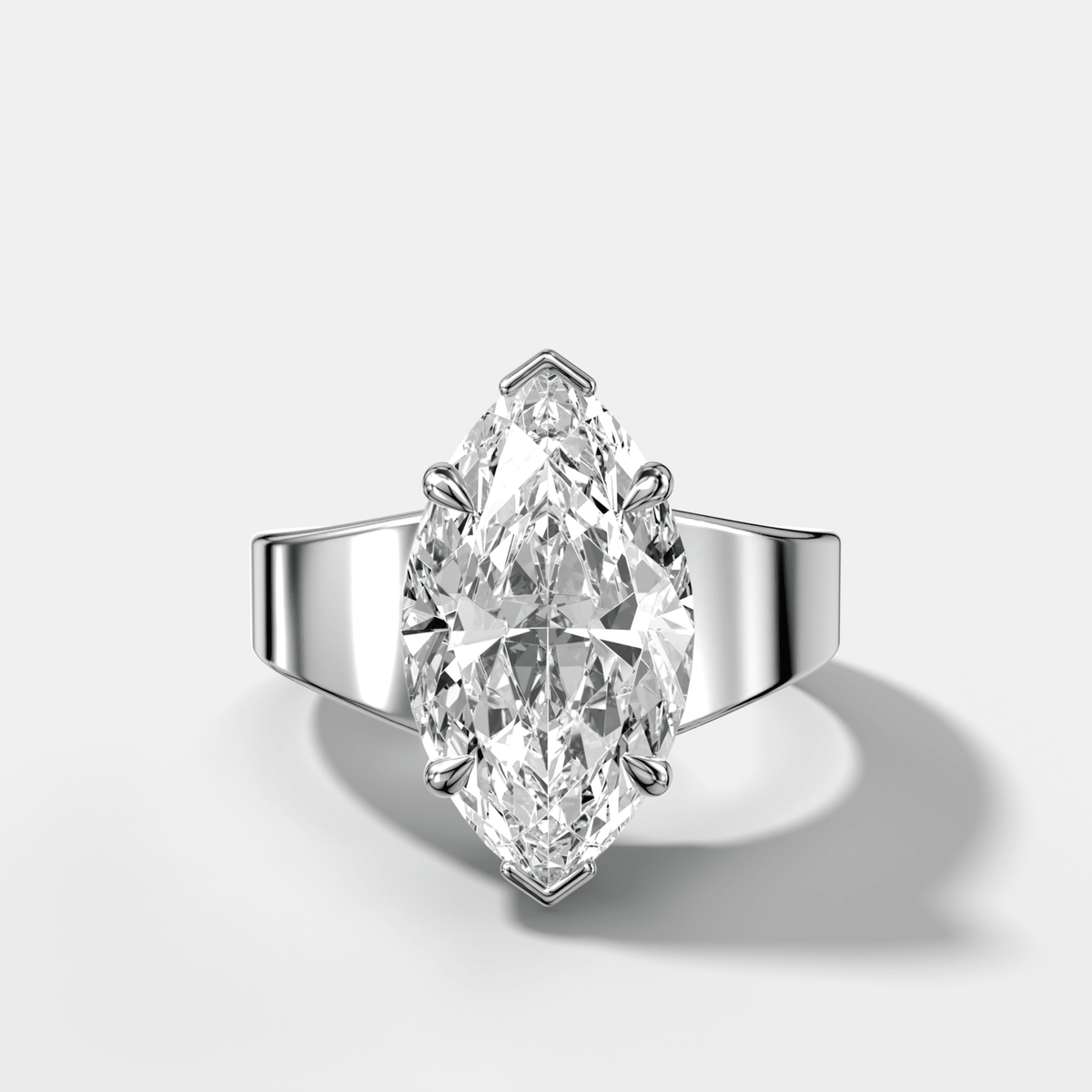 Finest Tapered Engagement Ring With Marquise Cut Diamond - GOODSTONE