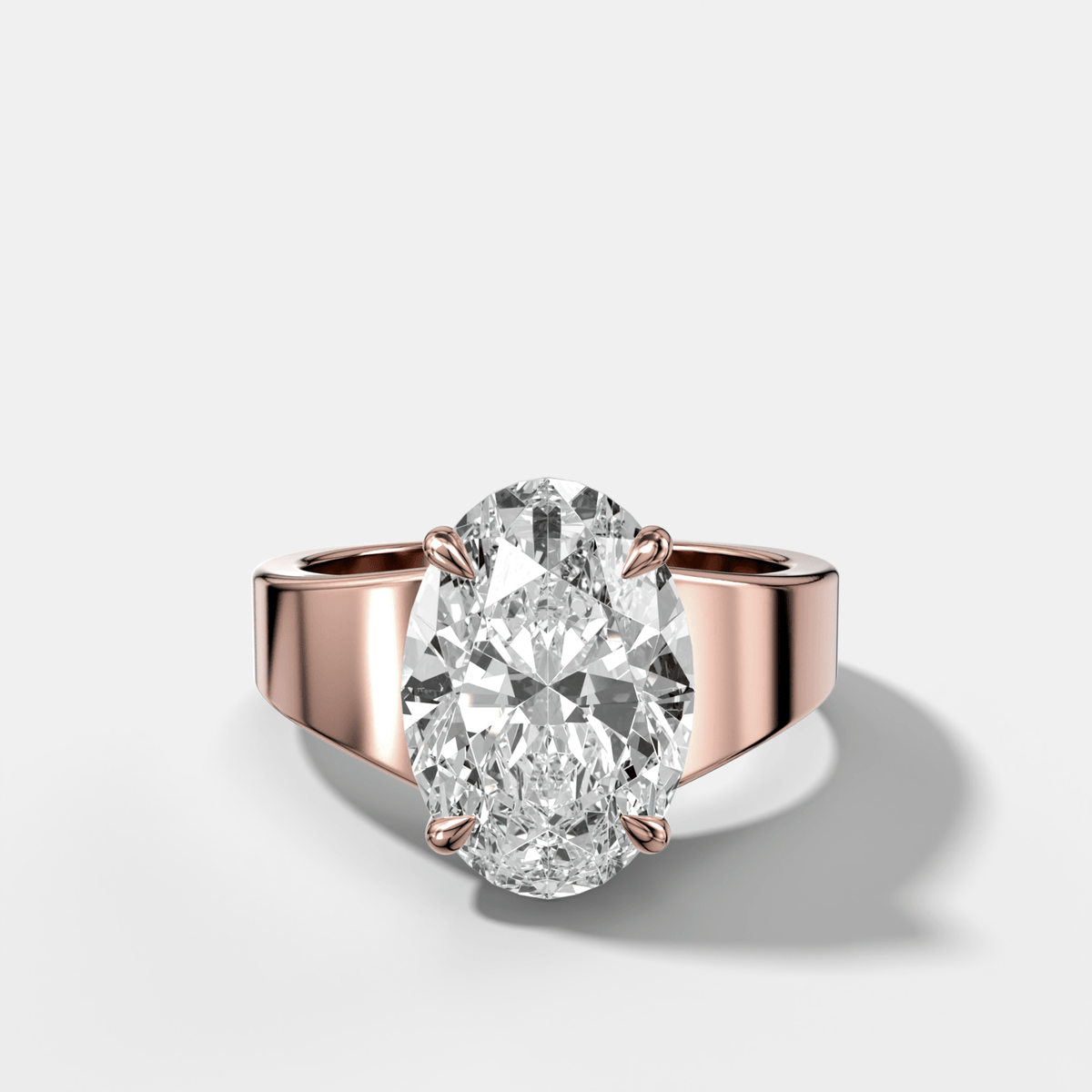 Finest Tapered Engagement Ring With Oval Cut Diamond - GOODSTONE