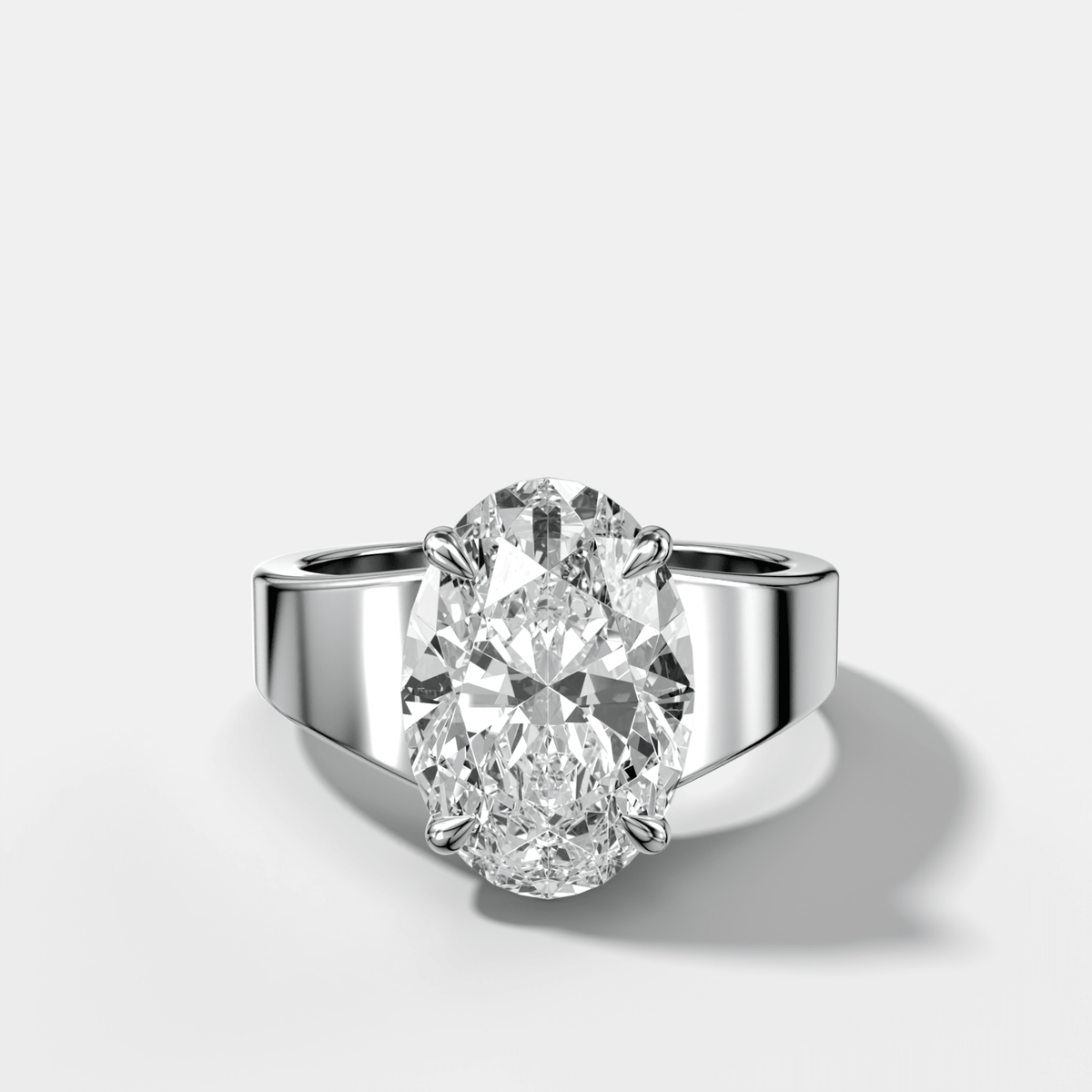Finest Tapered Engagement Ring With Oval Cut Diamond - GOODSTONE