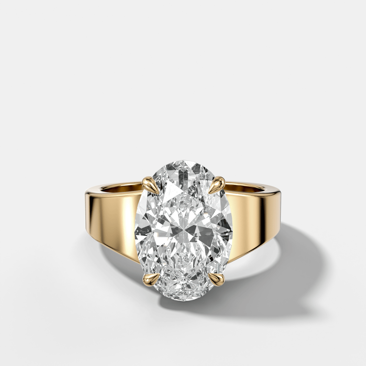 Finest Tapered Engagement Ring With Oval Cut Diamond - GOODSTONE