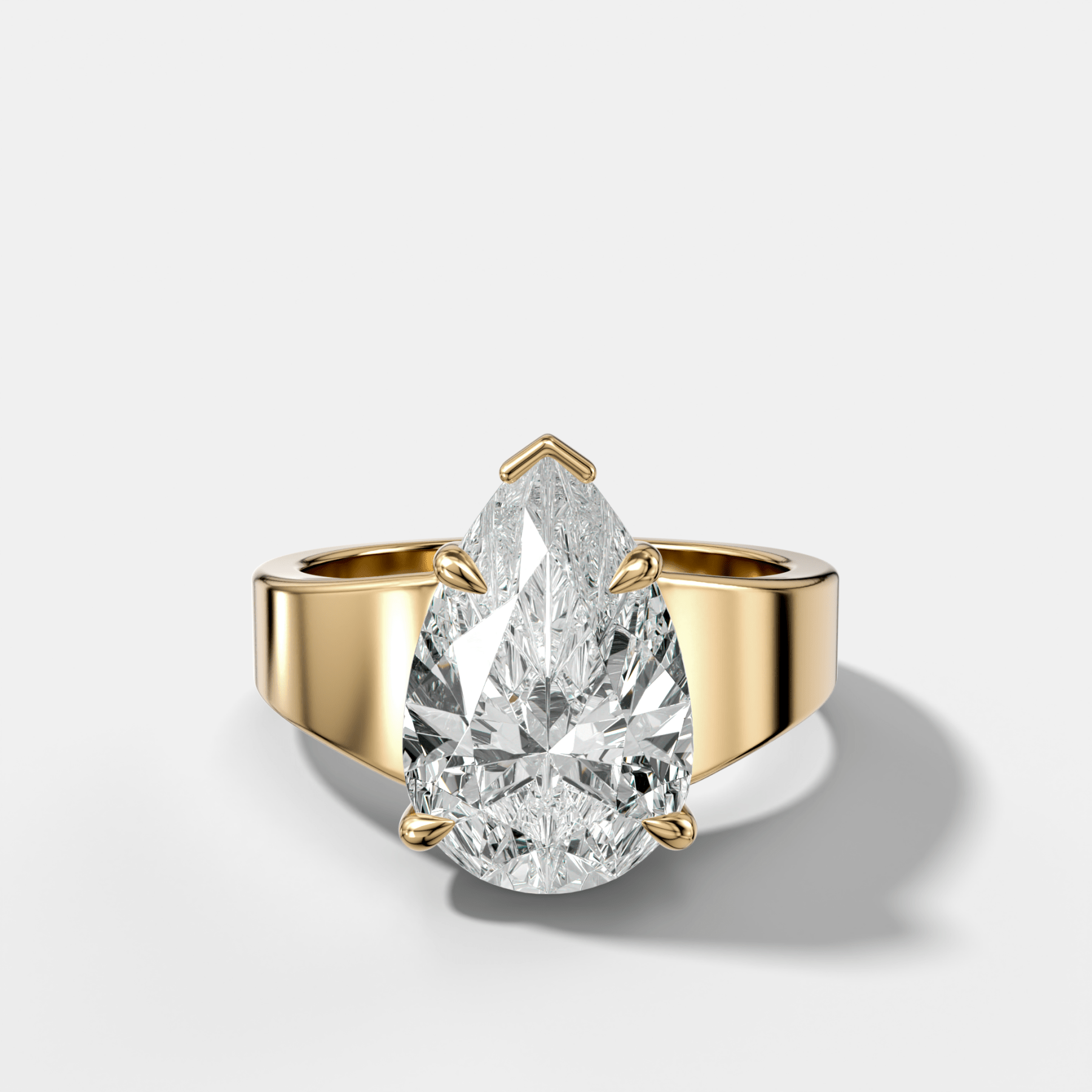 Finest Tapered Engagement Ring With Pear Cut Diamond - GOODSTONE