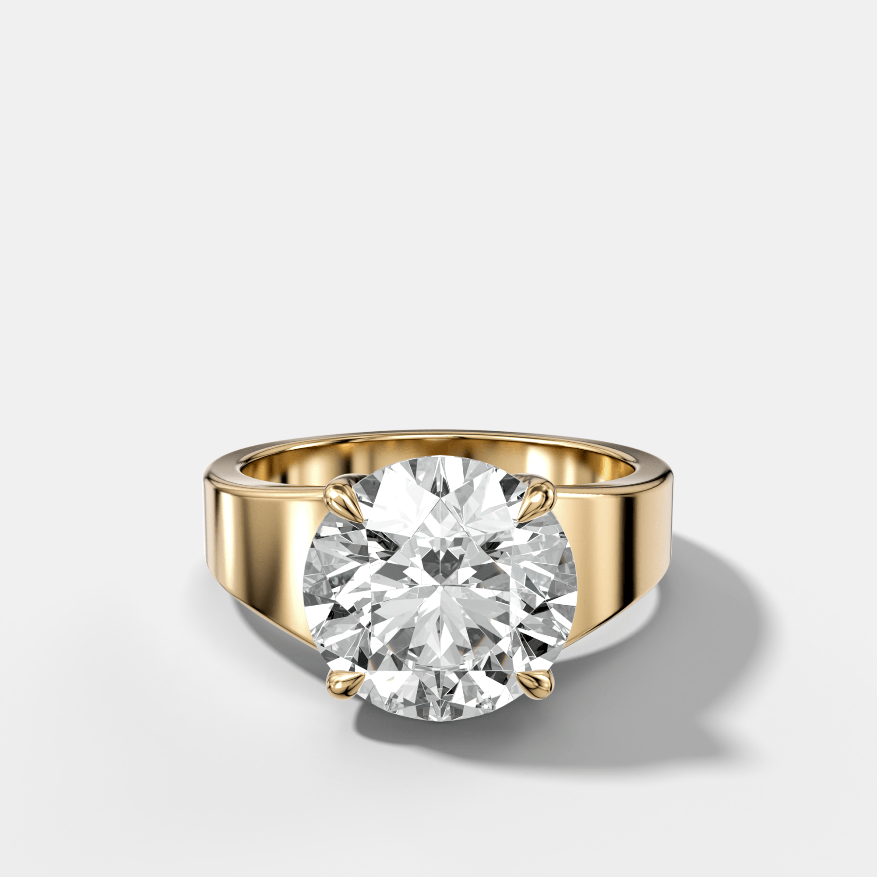 Finest Tapered Engagement Ring With Round Cut Diamond - GOODSTONE