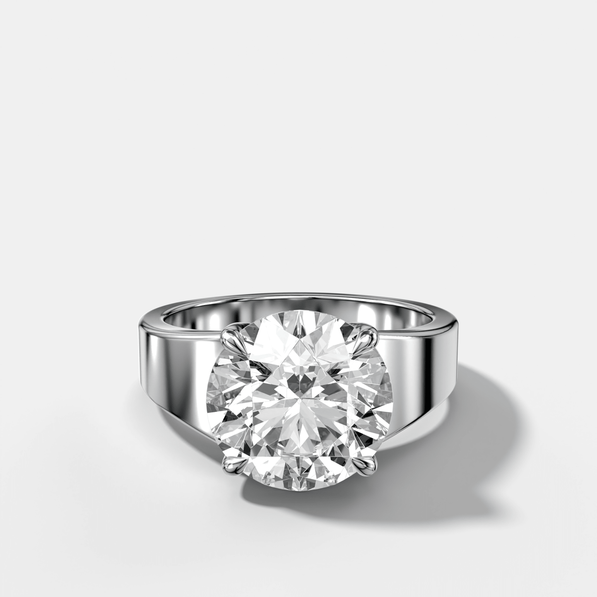 Finest Tapered Engagement Ring With Round Cut Diamond - GOODSTONE