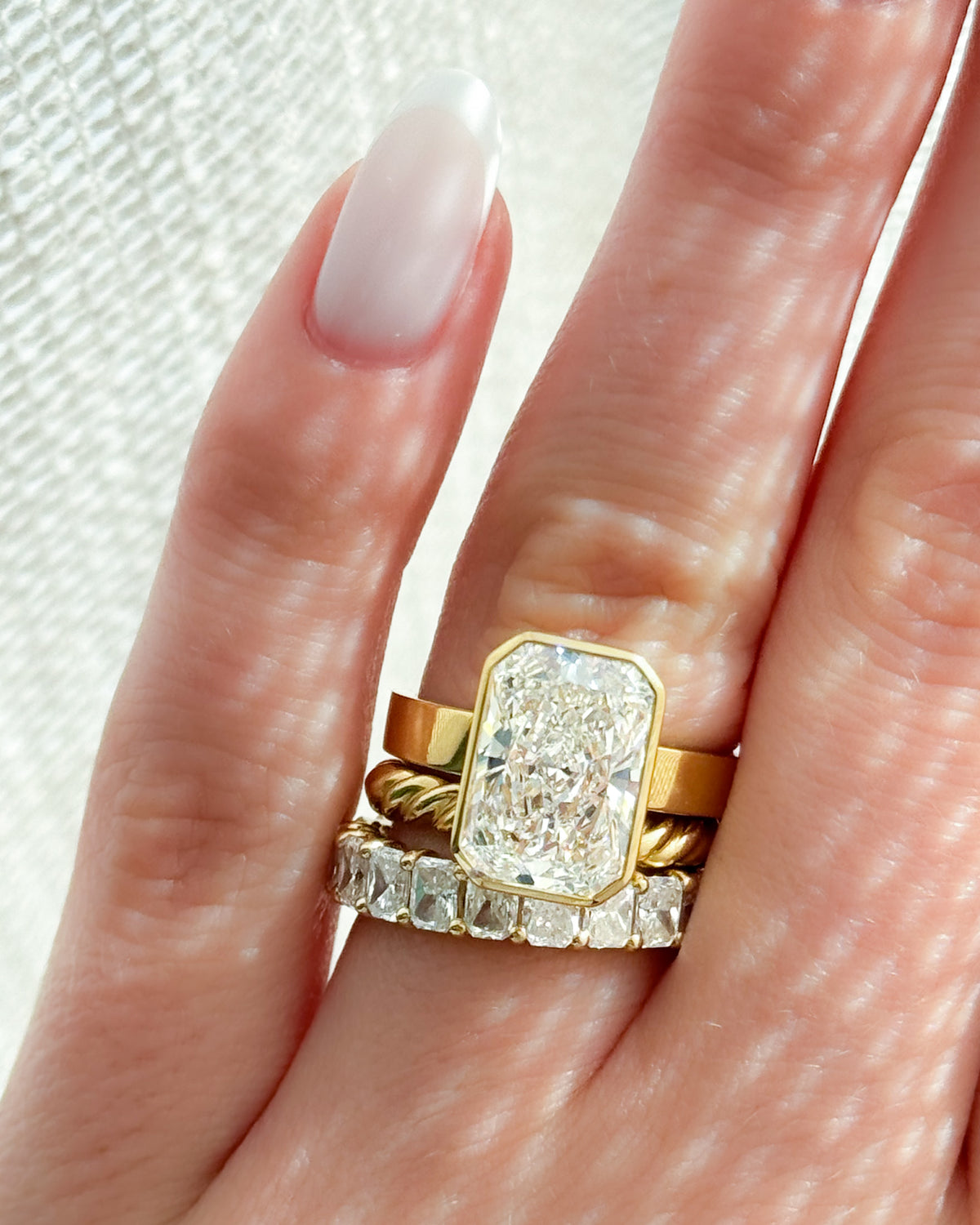 Finest Bezel Set Engagement Ring With Elongated Radiant Cut Diamond