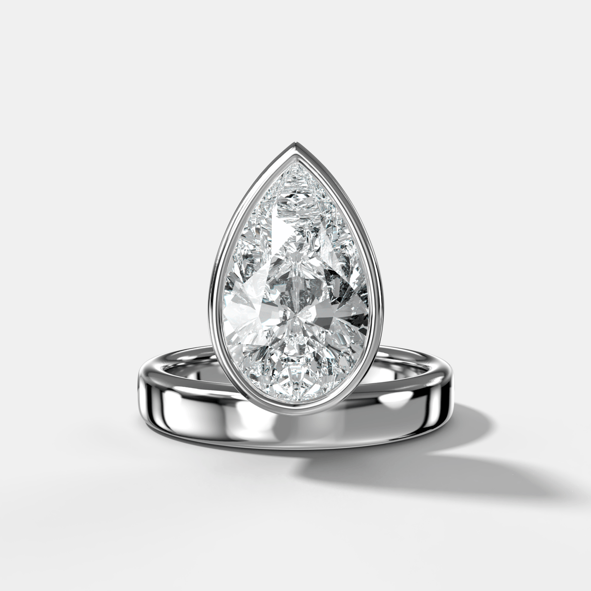 Floating Engagement Ring with Pear Cut Diamond - GOODSTONE