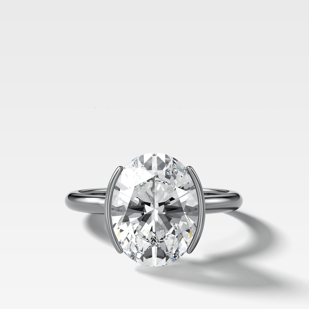 Half Bezel Solitaire Engagement Ring With Oval Cut Diamond - GOODSTONE